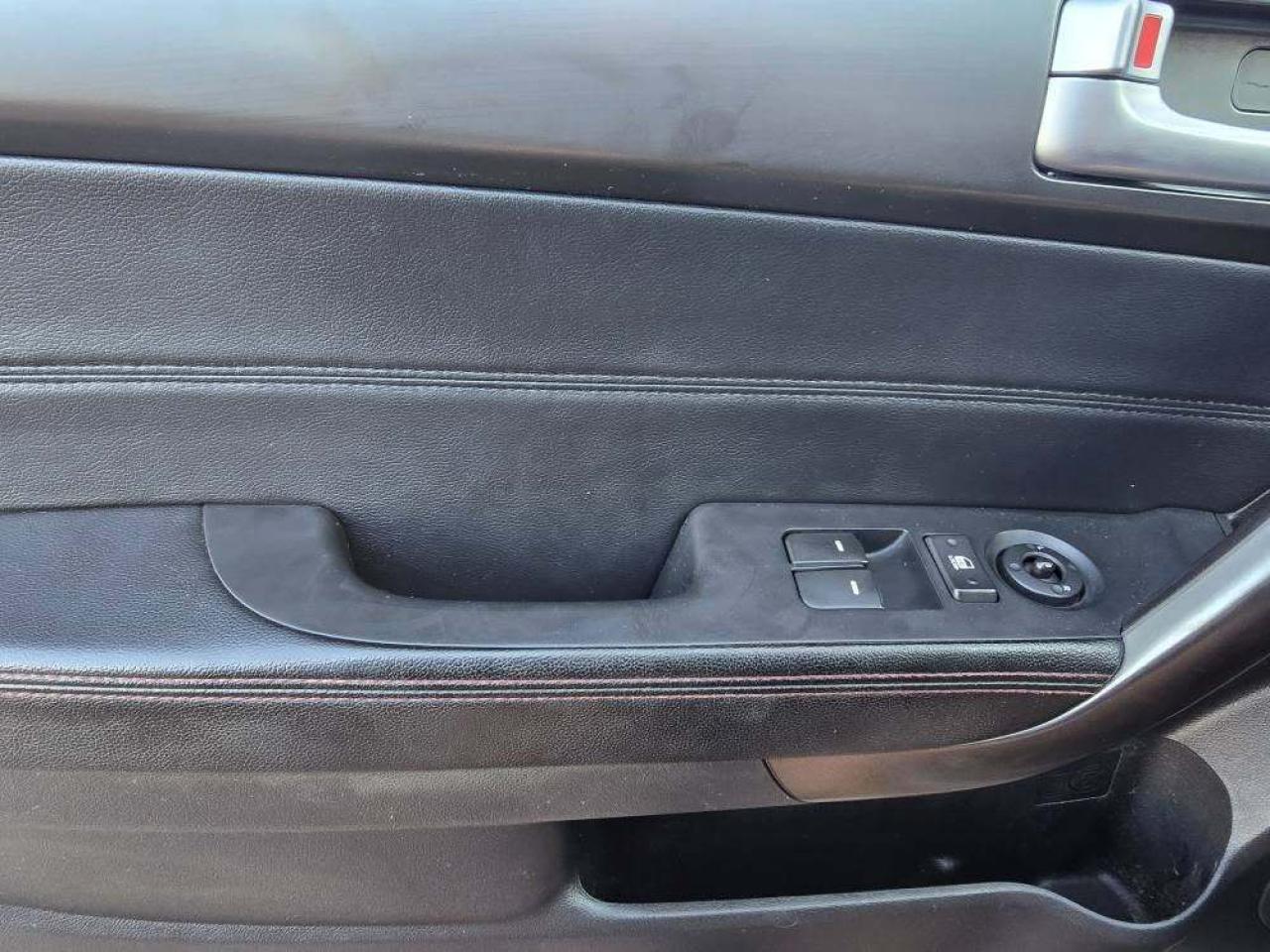 2010 Kia Forte Koup 2dr Cpe Auto SX Photo