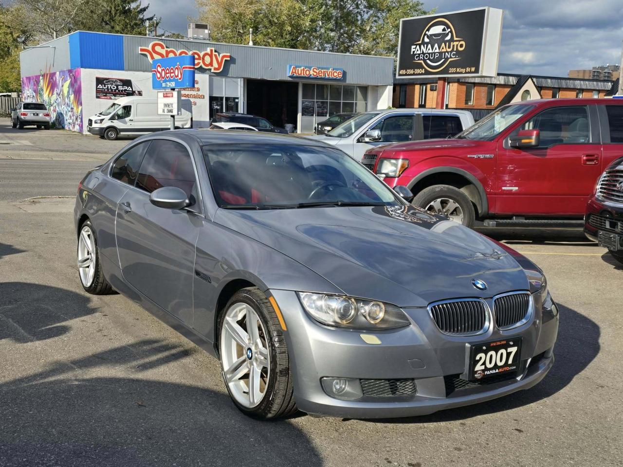 2007 BMW 3 Series 2dr Cpe 328xi AWD Photo
