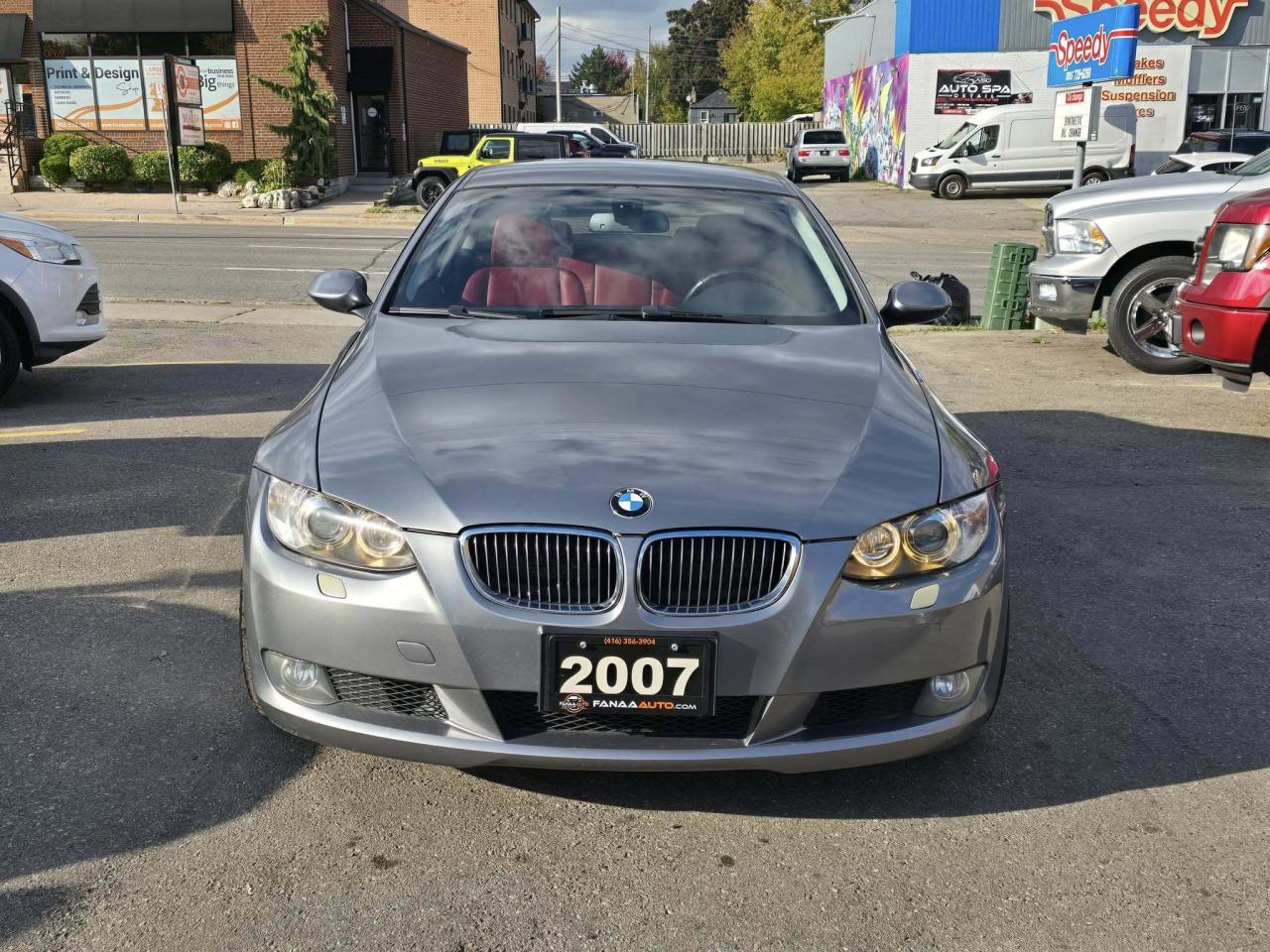 2007 BMW 3 Series 2dr Cpe 328xi AWD Photo