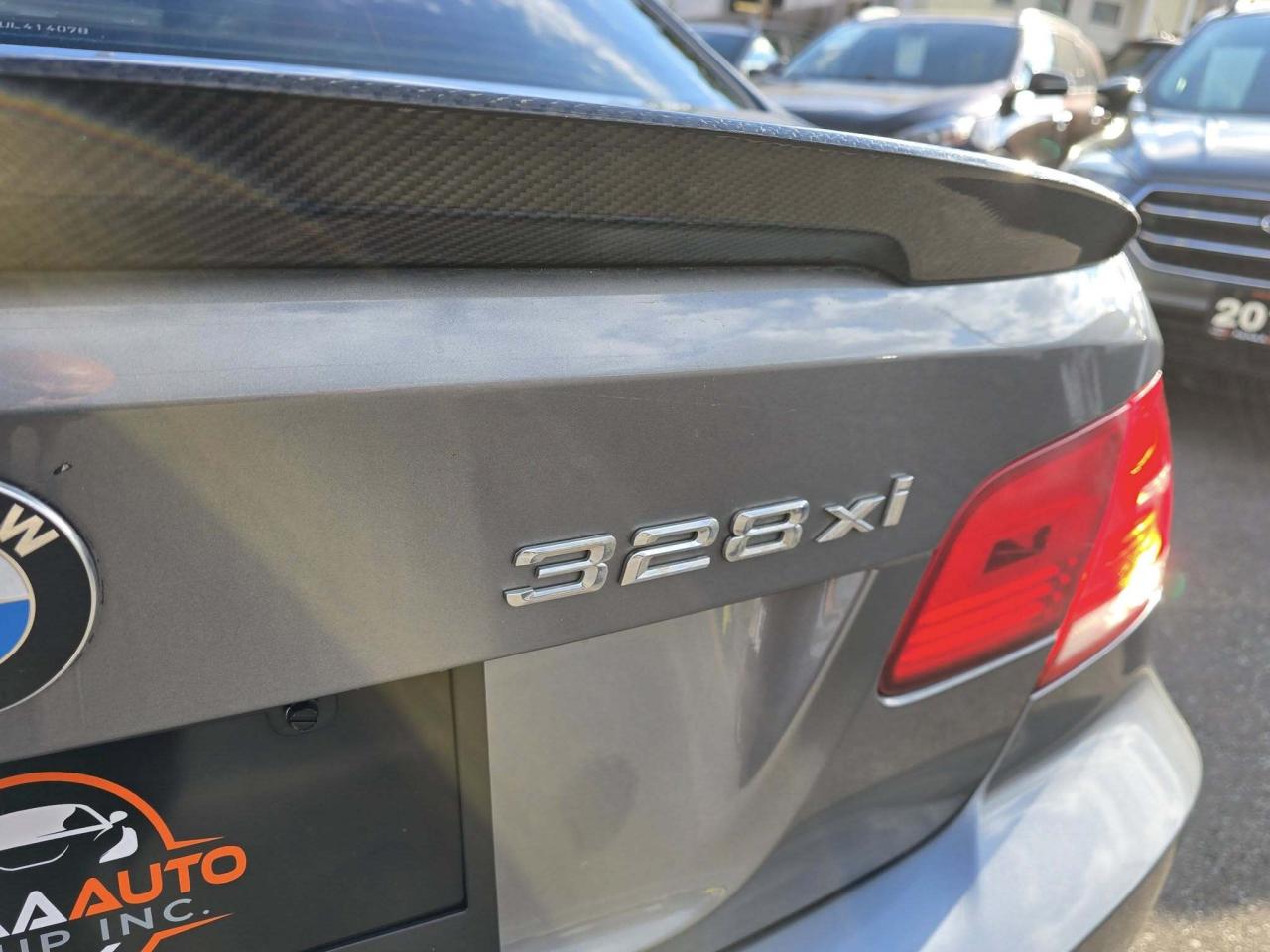 2007 BMW 3 Series 2dr Cpe 328xi AWD Photo