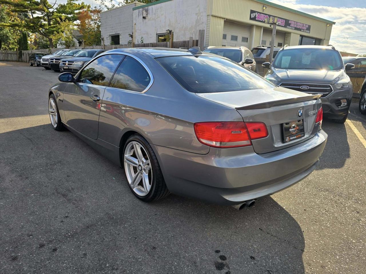 2007 BMW 3 Series 2dr Cpe 328xi AWD Photo