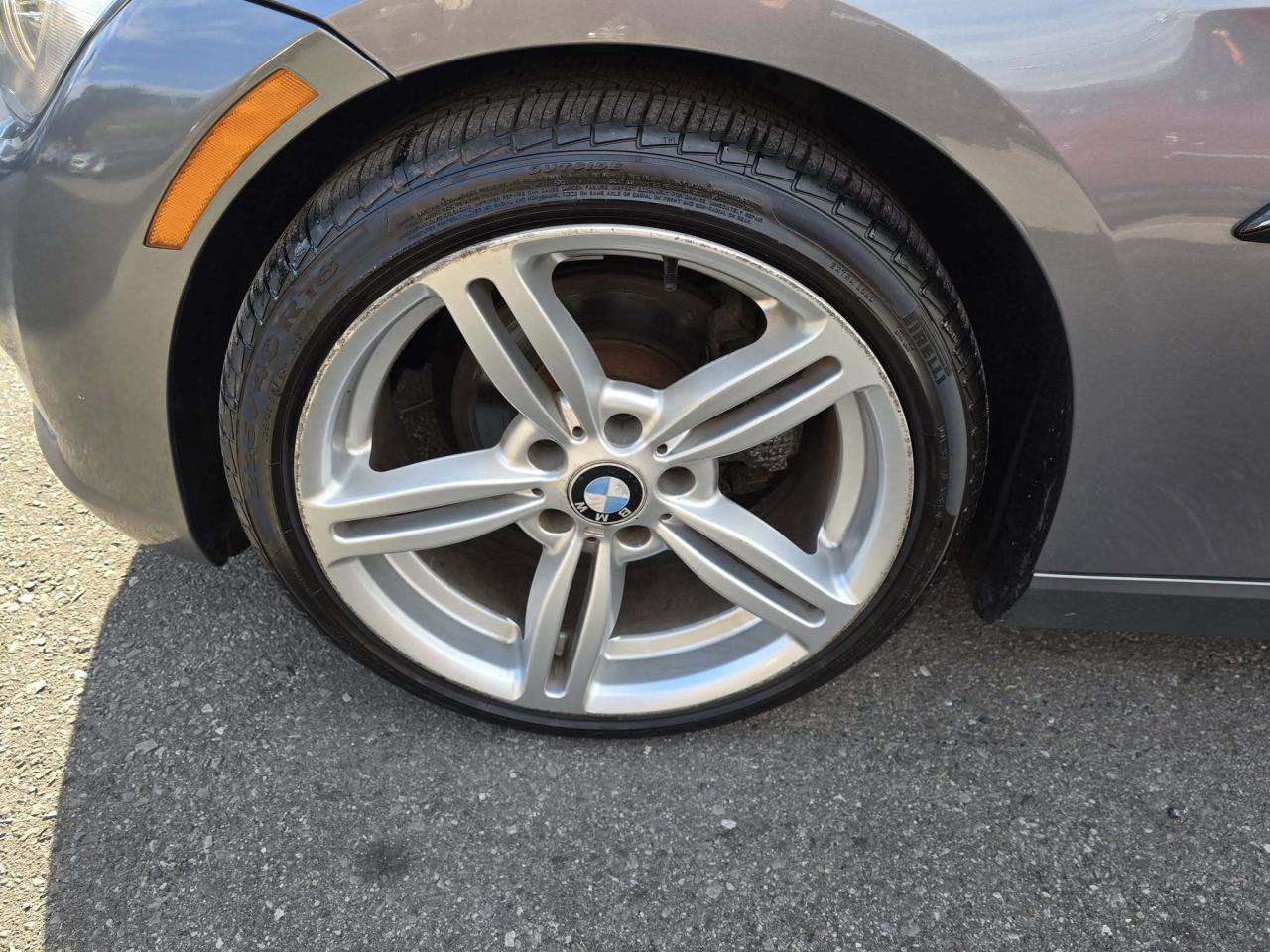 2007 BMW 3 Series 2dr Cpe 328xi AWD Photo