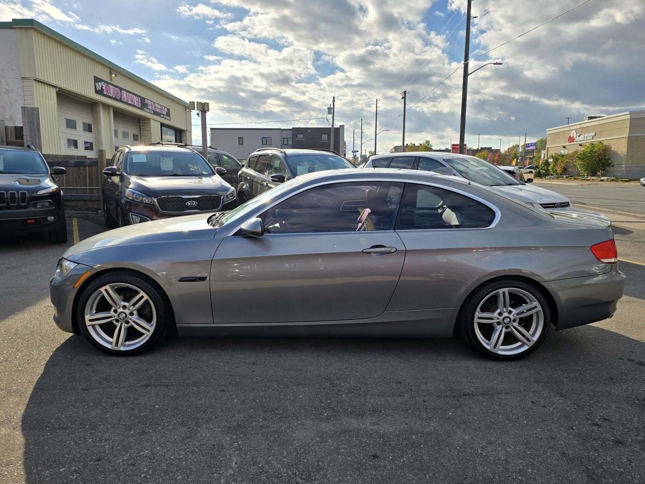 2007 BMW 3 Series 2dr Cpe 328xi AWD Photo