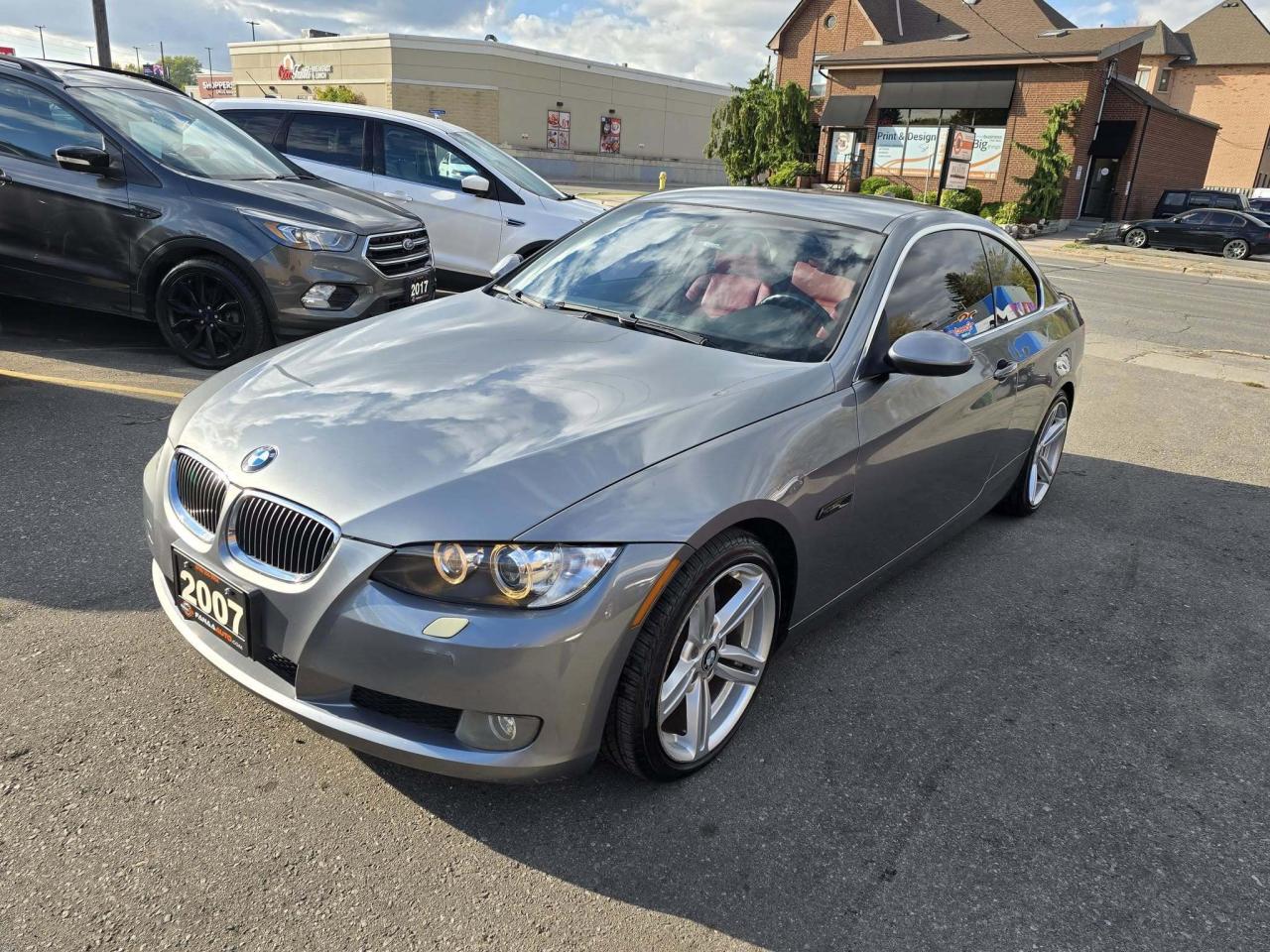 2007 BMW 3 Series 2dr Cpe 328xi AWD Photo