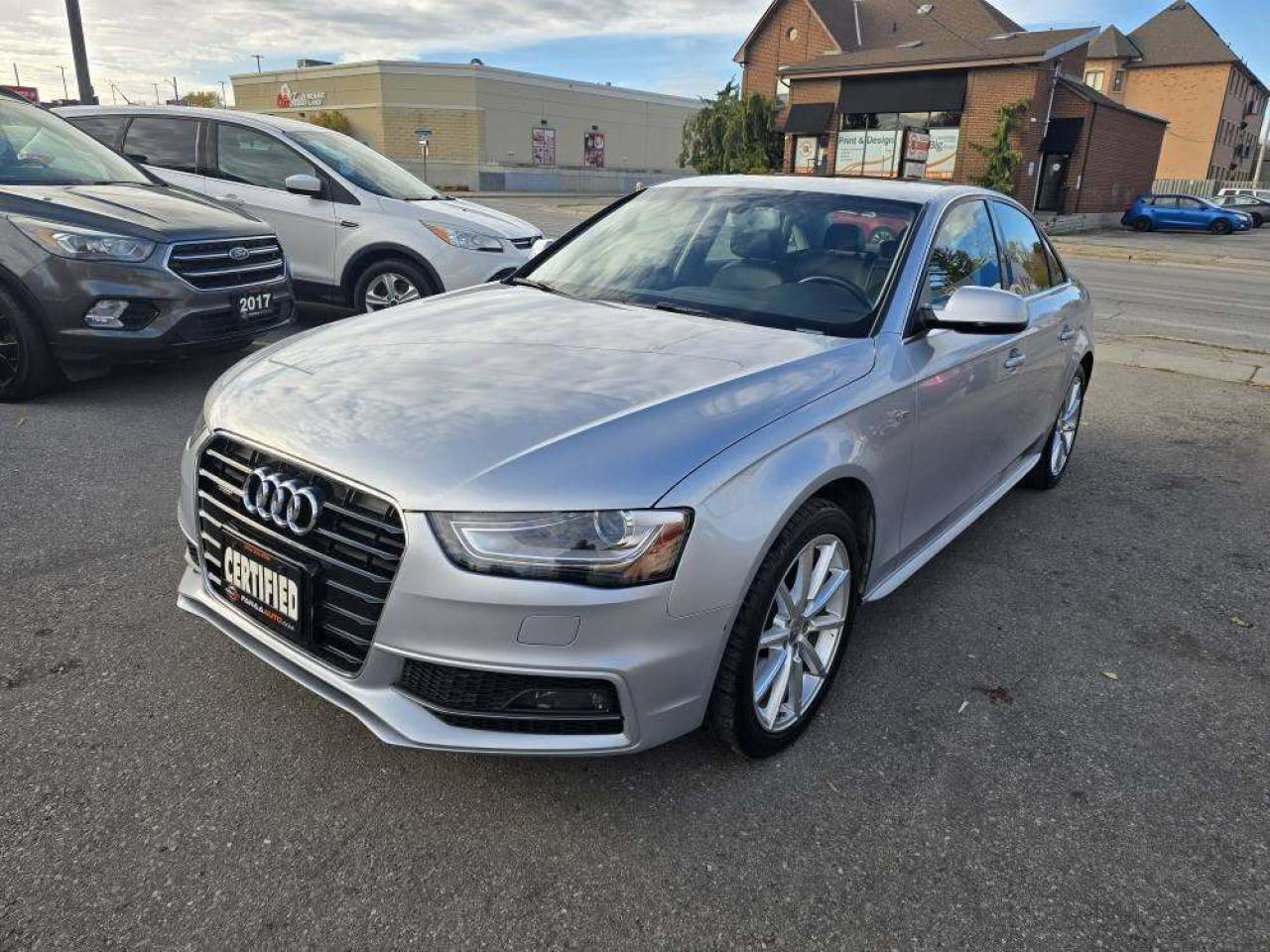 2015 Audi A4 4dr Sdn Auto Progressiv plus quattro Photo