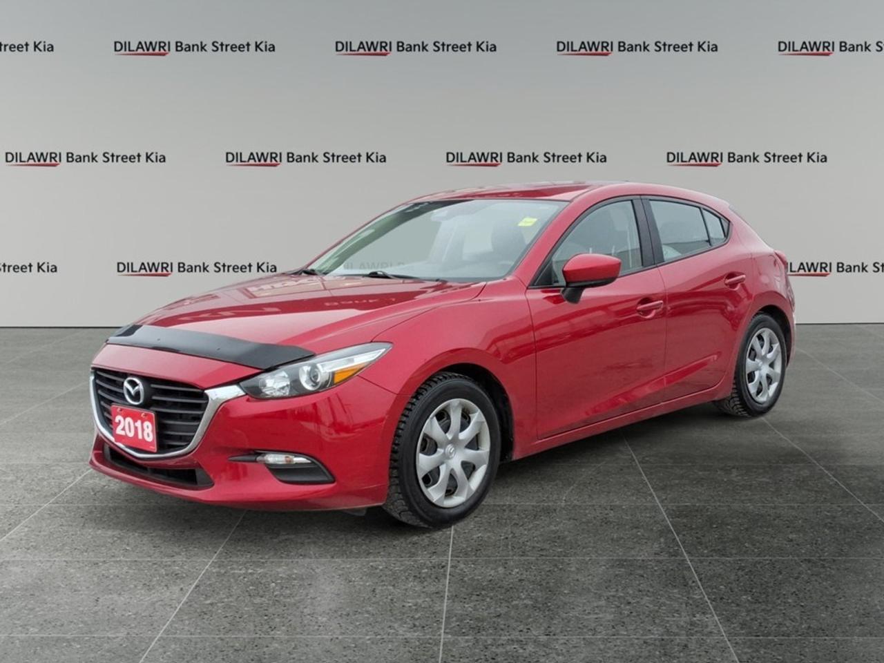 **CASH PURCHASE PRICE $14895** The 2018 Mazda Mazda3 Sport GX in a stunning exterior hue, with its manual transmission and FWD drivetrain, is designed for confident handling and a responsive drive. This hatchback model boasts an appealing balance of sportiness and functionality. Its exterior lines are a perfect combination of elegance and agility, offering a contemporary design that stands out on any road. Inside, the interior is well-crafted for comfort and practical use, featuring keyless entry, power windows, and a spacious layout that caters to both driver and passengers. This model is equipped with the latest technology and connectivity options including a backup camera, Bluetooth connection, and smart device integration. Safety does not take a backseat here, with brake assist enhancing your driving security. Cruise control adds to your journeys comfort, making long drives enjoyable and less stressful. Ideal for urban drivers or those who appreciate both style and economy, this Mazda3 Sport GX is perfect for navigating city streets with ease. Contact our dealership today for more information and to experience what makes this vehicle a great choice for your next car.