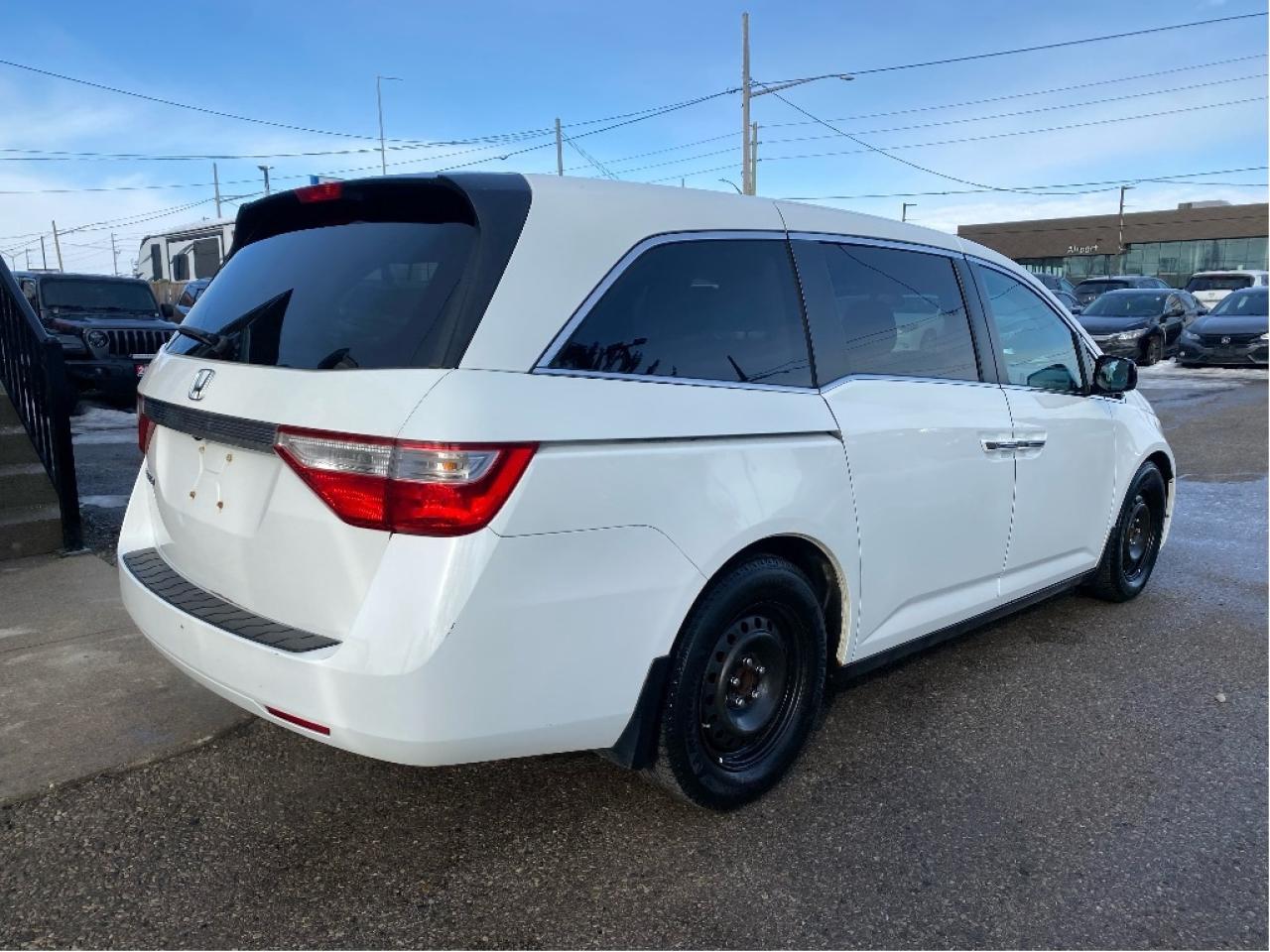 2011 Honda Odyssey EX. 2 sets of tires. Drives very well! Photo