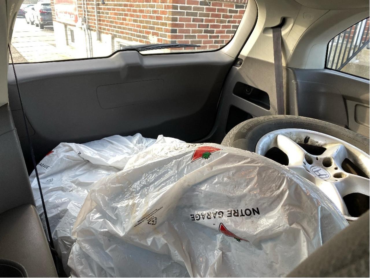 2011 Honda Odyssey EX. 2 sets of tires. Drives very well! Photo