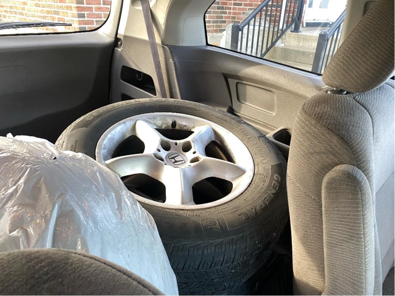 2011 Honda Odyssey EX. 2 sets of tires. Drives very well! Photo