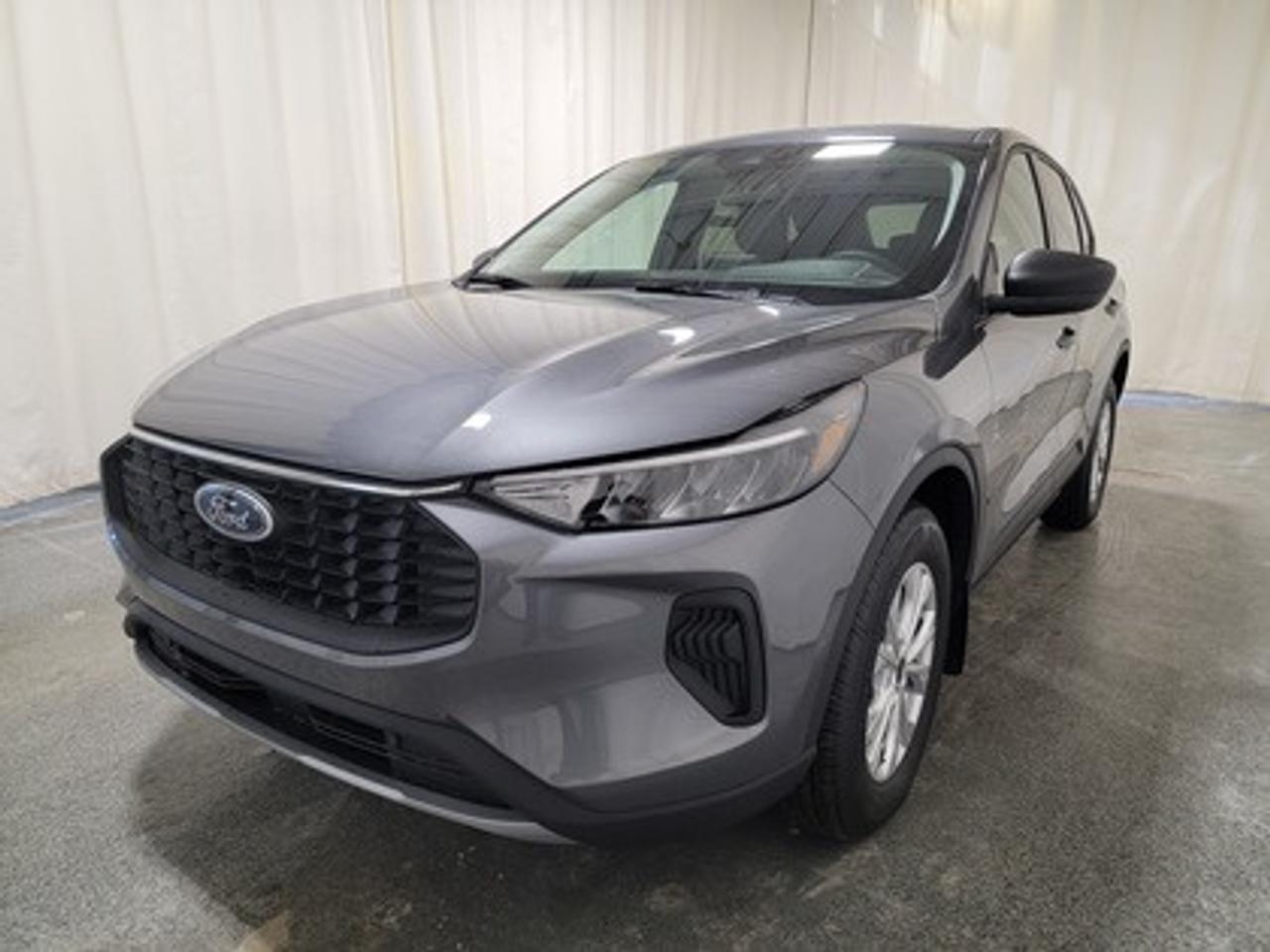 This all-new 2026 Escape Active 200A looks absolutely stunning in Carbonized Gray Metallic. This 5-passenger All-wheel drive crossover comes equipped with the 1.5L EcoBoost® engine. This remarkable engine not only produces 181 horsepower and 190 ft-lbs of torque, but by leveraging EcoBoost® technology and an 8-speed automatic transmission, this crossover is rated to get an estimated 8.4L/100km (34 miles per gallon) combined highway/city fuel economy.

This vehicle comes with the All-Weather Packageready to take on any season! 

Snow, rain, mud, or sunshinethis vehicle is built for it all! The All-Weather Package adds extra protection where it matters most, with premium mud flaps to shield your paint from road debris, all-weather floor mats to protect your interior from lifes messes, and Xpel paint protection to help guard against those infuriating rock chips. Drive with confidence, knowing your investment is protected from Regina's elements. 

Key Features:
8 Instrument panel cluster
 All-wheel drive
Ford Co-Pilot360
Heated Front Seats
Remote Start
Heated Mirrors
SYNC® 4 W/8 LCD Capacitive Touchscreen
Wireless Apple CarPlay® and Android Auto Compatibility
Privacy Glass
17 Shadow Silver Painted Aluminum Wheels
Power Windows
LED Taillamps
LED Headlamps
FordPass Connect
Rear Parking Sensor
Power Liftgate
Mini Spare Wheel/Tire

Saskatchewan has a challenging climate, but the 2026 Escape Active is a tough SUV designed with features and technology that keep you comfortable and safe. This specific vehicle is loaded with 4-wheel disc brakes, 17 all season tires, Dual zone electronic climate control, AdvanceTrac® with RSC® (Roll Stability Control), AWD, BLIS® (Blind Spot Information System) with Cross-Traffic Alert with Braking, Electronic Traction Control, Active Grille Shutters, Lane-Keeping System, Pedestrian Detection, Driver Alert, Dynamic Brake Support, and more, ensuring you're prepared for any journey.

Bennett Dunlop Ford, proudly serving Regina for over 40 years, is conveniently located at 770 Broad Street. With over 3,500 Google reviews, our reputation reflects our commitment to providing a fast, easy, and enjoyable vehicle-buying experience. We eliminate the hassle with no admin or documentation fees, transparent upfront pricing that lets you shop with total confidence. But were more than just a dealershipwere driven to make a difference by supporting local community initiatives and events that matter to you. Visit Bennett Dunlop Ford today and experience why were Reginas trusted choice for quality vehicles, exceptional service, and a genuine commitment to driving change in our community!