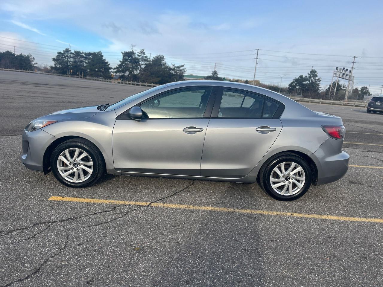 2012 Mazda MAZDA3 4dr Sdn Auto GX Photo