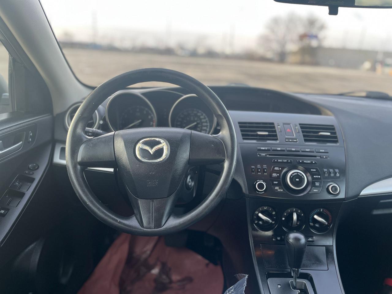 2012 Mazda MAZDA3 4dr Sdn Auto GX Photo