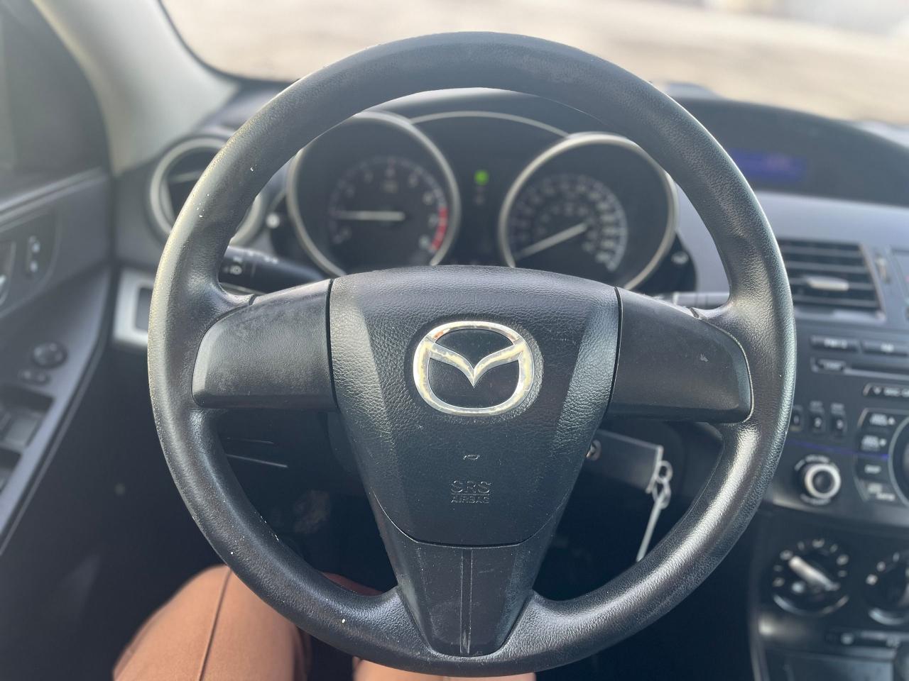 2012 Mazda MAZDA3 4dr Sdn Auto GX Photo