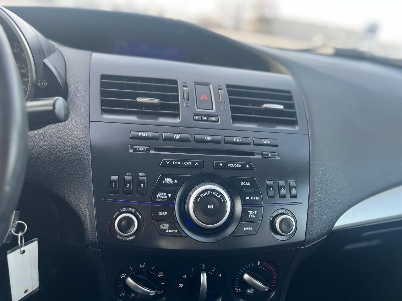 2012 Mazda MAZDA3 4dr Sdn Auto GX Photo