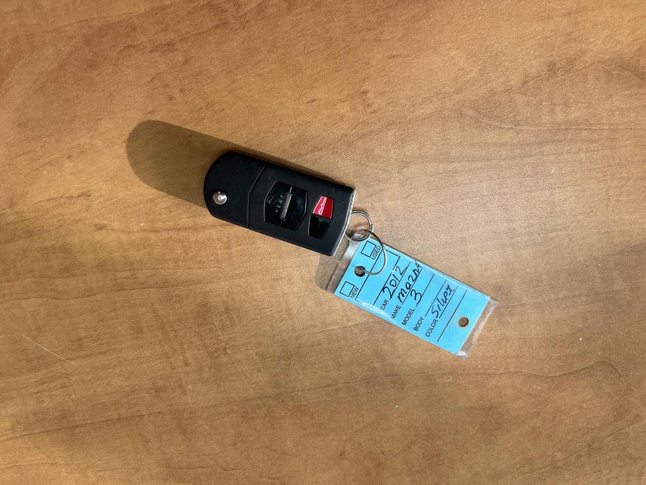 2012 Mazda MAZDA3 4dr Sdn Auto GX Photo