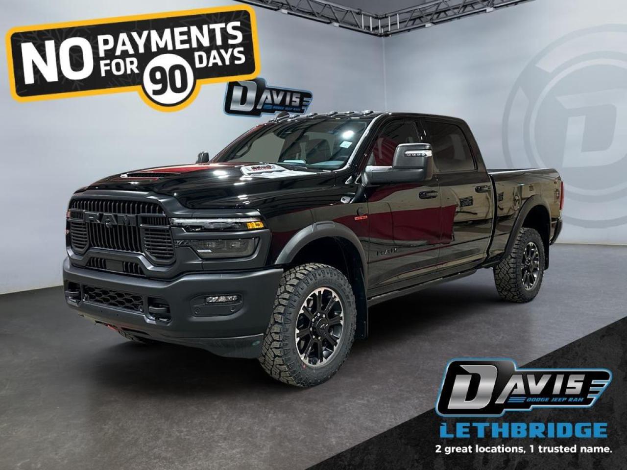 <b>Navigation, Heated Seats, Blind Spot Detection, Remote Start, Heated Steering Wheel!<br /> <br /></b><br /> <br /> <br />Experience ultimate power and off-road capability with the 2026 Ram 2500 Rebel Crew Cab in Diamond Black Crystal Pearl. Equipped with a 6.7L Cummins Turbo Diesel I6 engine and 8-speed TorqueFlite HD automatic transmission, this 4x4 powerhouse features Rebel performance suspension, 20 Black Diamond-Cut wheels, LT285/60R20 all-terrain tires, powder-coated bumpers, LED lighting, MOPAR rock rails, and a spray-in bedliner.<br /><br />Inside, enjoy premium comfort with leather-trimmed heated and ventilated bucket seats, full-length upgraded floor console, folding 60/40 rear seat, dual-zone climate, Uconnect 5 NAV with 14.4 touchscreen, Apple CarPlay, Android Auto, Alexa built-in, 17-speaker Harman Kardon audio, and dual wireless charging.<br /><br />Safety and towing capabilities are enhanced with adaptive cruise control with stop, ParkView rear camera, ParkSense front/rear park assist, blind-spot monitoring with cross-path detection, Class V receiver hitch, trailer sway damping, tow hooks, and tip start. Perfect for off-road adventures, towing, or heavy-duty work, the 2026 Ram 2500 Rebel combines rugged durability with advanced technology and refined interior comfort.<br /> <br />To apply right now for financing use this link: <a href=https://www.bridgecitychrysler.com/pre-approval/ target=_blank rel=nofollow noopener noreferrer>https://www.bridgecitychrysler.com/pre-approval/</a><br /><br /> <br /><br />As a premier Chrysler, Dodge, Jeep and RAM dealership, Bridge City Chrysler proudly offers an extensive selection of new and used vehicles to meet every drivers needs. Customers across Lethbridge, Fort Macleod, Taber, Claresholm, Coaldale, and beyond trust us for daily vehicle specials, certified service and parts, and a seamless online inventory experience. <br /><br /> With competitive financing options and expert support, we make car buying easy and enjoyable. <br /><br /> Ready to hit the road? Schedule your test drive today at Bridge City Chrysler, your trusted Chrysler, Dodge, Jeep and RAM dealer in Lethbridge, Alberta.<br /><br /> Vehicle pricing offer shown expires 2026-01-31. <br /> Come by and check out our fleet of 80+ used cars and trucks and 120+ new cars and trucks for sale in Lethbridge. o~o