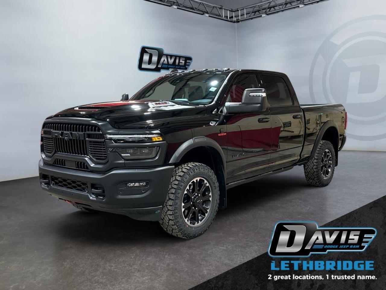 <b>Navigation, Heated Seats, Blind Spot Detection, Remote Start, Heated Steering Wheel!<br /> <br /></b><br /> <br /> <br />Experience ultimate power and off-road capability with the 2026 Ram 2500 Rebel Crew Cab in Diamond Black Crystal Pearl. Equipped with a 6.7L Cummins Turbo Diesel I6 engine and 8-speed TorqueFlite HD automatic transmission, this 4x4 powerhouse features Rebel performance suspension, 20 Black Diamond-Cut wheels, LT285/60R20 all-terrain tires, powder-coated bumpers, LED lighting, MOPAR rock rails, and a spray-in bedliner.<br /><br />Inside, enjoy premium comfort with leather-trimmed heated and ventilated bucket seats, full-length upgraded floor console, folding 60/40 rear seat, dual-zone climate, Uconnect 5 NAV with 14.4 touchscreen, Apple CarPlay, Android Auto, Alexa built-in, 17-speaker Harman Kardon audio, and dual wireless charging.<br /><br />Safety and towing capabilities are enhanced with adaptive cruise control with stop, ParkView rear camera, ParkSense front/rear park assist, blind-spot monitoring with cross-path detection, Class V receiver hitch, trailer sway damping, tow hooks, and tip start. Perfect for off-road adventures, towing, or heavy-duty work, the 2026 Ram 2500 Rebel combines rugged durability with advanced technology and refined interior comfort.<br /> <br />To apply right now for financing use this link: <a href=https://lethbridge.davisdodge.ca/free-credit-check/ target=_blank rel=nofollow noopener noreferrer>https://lethbridge.davisdodge.ca/free-credit-check/</a><br /><br /> <br /><br />As a premier Chrysler, Dodge, Jeep and RAM dealership, Davis Dodge proudly offers an extensive selection of new and used vehicles to meet every drivers needs. Customers across Lethbridge, Fort Macleod, Taber, Claresholm, Coaldale, and beyond trust us for daily vehicle specials, certified service and parts, and a seamless online inventory experience. <br /><br /> With competitive financing options and expert support, we make car buying easy and enjoyable. <br /><br /> Ready to hit the road? Schedule your test drive today at Davis Dodge, your trusted Chrysler, Dodge, Jeep and RAM dealer in Lethbridge, Alberta.<br /><br /> Vehicle pricing offer shown expires 2026-03-31. <br /> Come by and check out our fleet of 70+ used cars and trucks and 130+ new cars and trucks for sale in Lethbridge. o~o