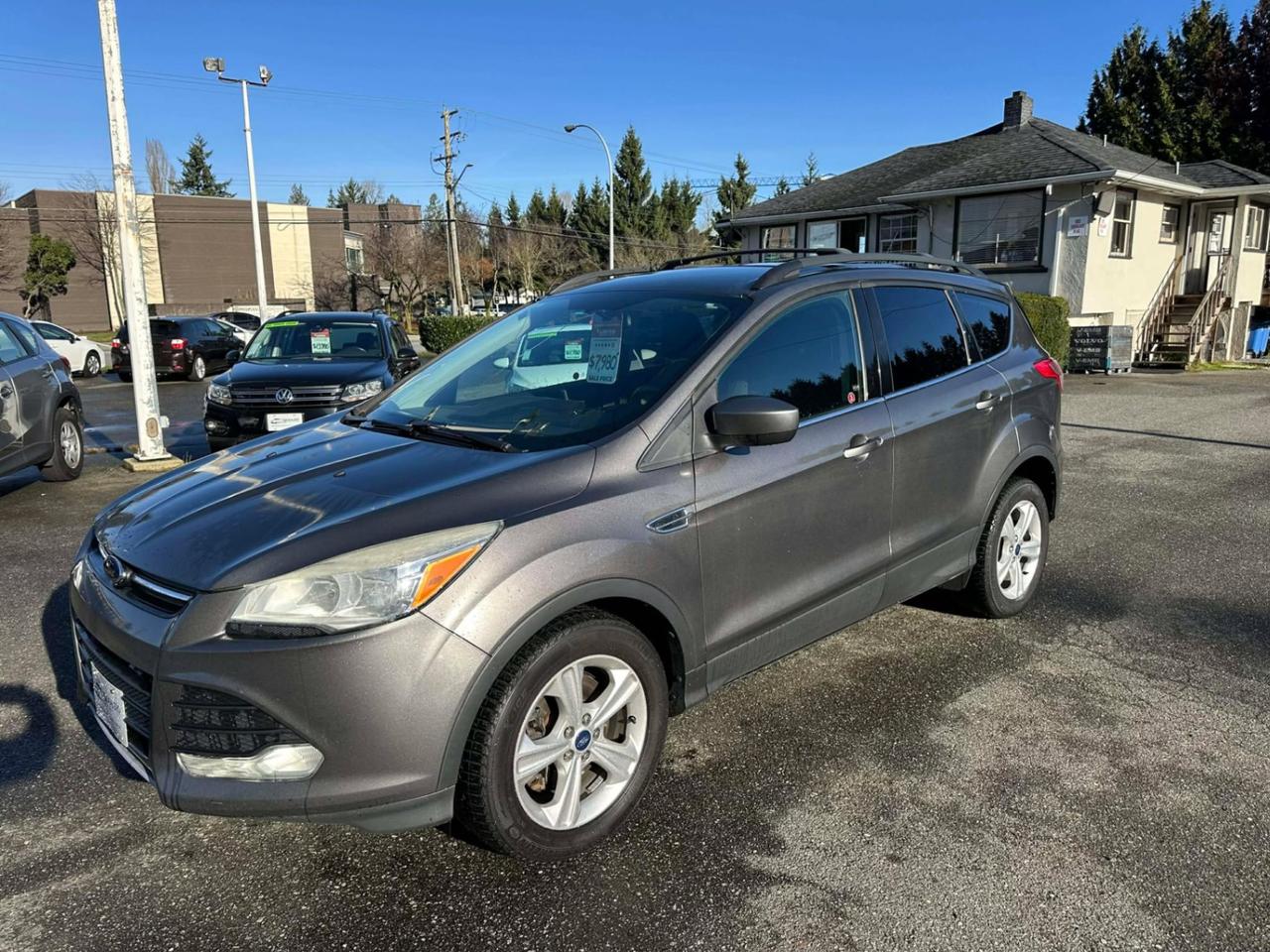 <p><strong> 2013 Ford Escape SE 4x4  Ready for Winter & Adventure! </strong></p><p> <strong>214,653 km | Automatic | Four-Wheel Drive</strong><br>A solid SUV with all the comfort + tech you need!</p><p> <strong>Features:</strong></p><ul><li><p> Heated seats</p></li><li><p> Reverse camera</p></li><li><p> Bluetooth</p></li><li><p> A/C &  Cruise control</p></li><li><p> Power windows/locks/mirrors</p></li><li><p> Cloth interior  5 passenger</p></li><li><p> Tilt steering</p></li></ul><p>Confident in all seasons  perfect daily driver or weekend getaway machine!</p><p> Message now for viewing <span id=jodit-selection_marker_1764368420819_728448909481716 data-jodit-selection_marker=start style=line-height: 0; display: none;></span></p> <p><br></p><p>Excellent, Affordable Lubrico Warranty Options Available on ALL Vehicles!</p><p><span style=background-color: rgba(var(--bs-white-rgb),var(--bs-bg-opacity)); color: var(--bs-body-color); font-family: open-sans, -apple-system, BlinkMacSystemFont, "Segoe UI", Roboto, Oxygen, Ubuntu, Cantarell, "Fira Sans", "Droid Sans", "Helvetica Neue", sans-serif; font-size: var(--bs-body-font-size); font-weight: var(--bs-body-font-weight); text-align: var(--bs-body-text-align);>All Vehicles are Safety Inspected by a 3rd Party Inspection Service.&nbsp;</span><br><br>We speak English, French, German, Punjabi, Hindi and Urdu Language!&nbsp;</p><p><br>We are proud to have sold over 15,000 vehicles to our customers throughout B.C. from this same&nbsp;location in Surrey.<span id=jodit-selection_marker_1747949601815_3502933354387793 data-jodit-selection_marker=start style=line-height: 0; display: none;></span></p><p><br>What Makes Us Different? <br>All of our vehicles have been sent to us from new car dealerships. They are all trade-ins and we are a large remarketing centre for the lower mainland new car dealerships. We do not purchase vehicles at auctions or from private sales. <br> <br>Administration Fee of $450<br> <br>Disclaimer: <br>Vehicle options are inputted from a VIN decoder. As we make our best effort to ensure all details are accurate we can not guarantee the information that is decoded from the VIN. Please verify any options before purchasing the vehicle. <br> <br>B.C. Dealers Trade-In Centre <br>14458 104th Ave. <br>Surrey, BC <br>V3R1L9 <br>DL# 26220</p><p> <br> </p><p>6-0-4-5-8-5-1-8-3-1</p>