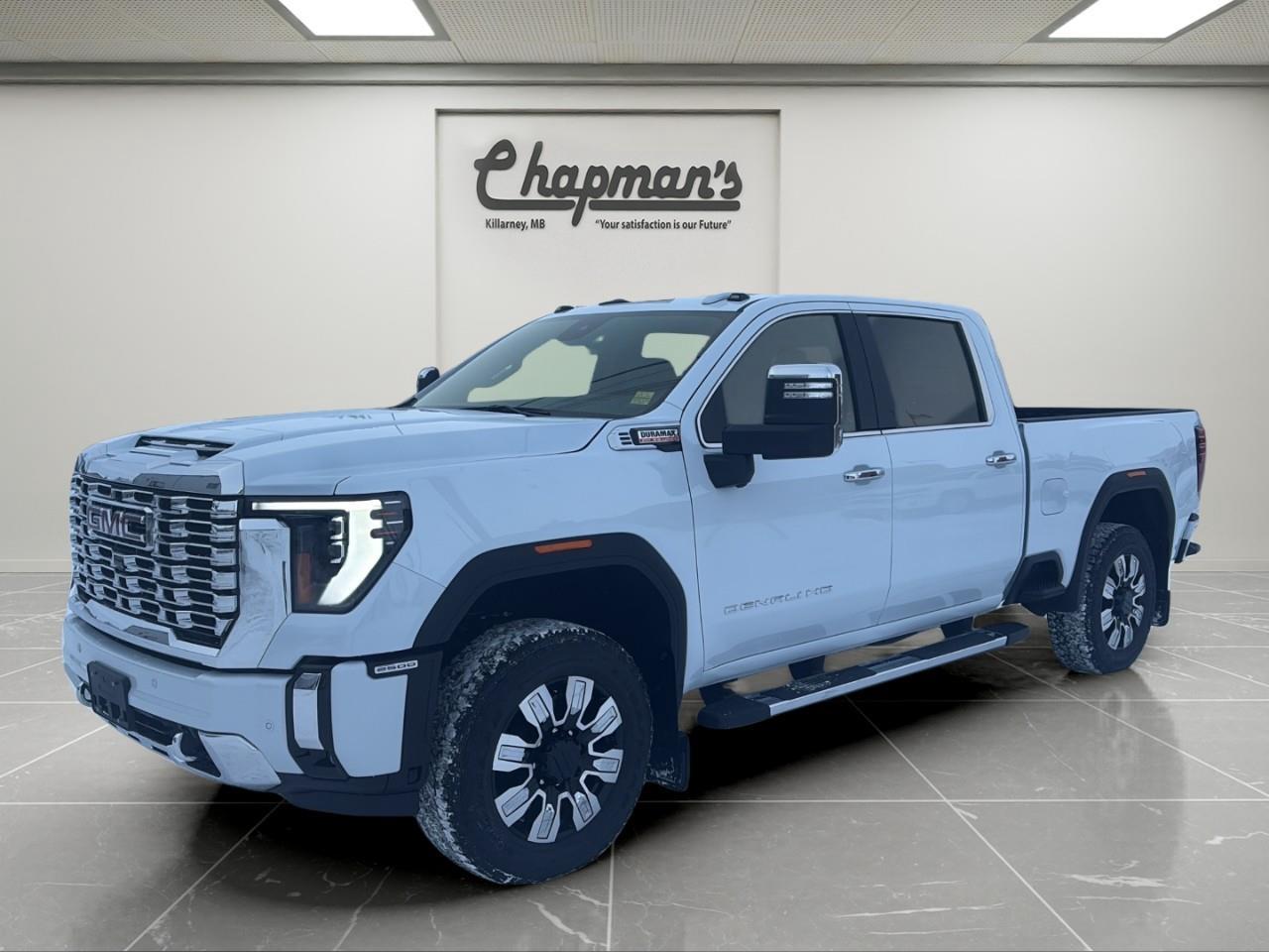 <p>The <strong>2026 GMC Sierra 2500 Denali Crew Cab 4WD</strong> is the perfect fusion of heavy-duty capability and premium refinement. Finished in stunning <strong>Glacier White Tricoat</strong> with an upscale <strong>Atmosphere/Brownstone leather interior</strong>, this Denali makes a commanding statement while delivering world-class comfort and technology.</p><p>At its core is the legendary <strong>Duramax 6.6L Turbo-Diesel V8</strong>, paired with a <strong>10-speed Allison® automatic transmission</strong> for massive torque, smooth shifting, and outstanding towing confidence. With the <strong>Gooseneck / 5th-Wheel Prep Package</strong> and advanced trailering technology, this Sierra is built for serious work and serious luxury.</p><h3><strong>Heavy-Duty Performance & Capability</strong></h3><p>Built to tow, haul, and conquer:</p><ul><li><p><strong>Duramax 6.6L Turbo-Diesel V8</strong></p></li><li><p><strong>10-Speed Allison® Automatic Transmission</strong></p></li><li><p><strong>2-Speed AutoTrac® Transfer Case</strong></p></li><li><p><strong>Automatic Locking Rear Differential</strong></p></li><li><p><strong>Trailer Brake Controller</strong></p></li><li><p><strong>Trailering Package with Hitch View & Hitch Guidance</strong></p></li><li><p><strong>In-Vehicle Trailering App</strong></p></li><li><p><strong>Gooseneck / 5th-Wheel Prep Package</strong></p></li><li><p><strong>GVWR: 4,490 kg (9,900 lb)</strong></p></li></ul><h3><strong>Denali Interior Luxury</strong></h3><p>A heavy-duty truck with true luxury-SUV comfort:</p><ul><li><p><strong>Heated & Ventilated Front Leather Seats</strong></p></li><li><p><strong>Heated Second-Row Outboard Seats</strong></p></li><li><p><strong>12-Way Power Driver Seat with Memory</strong></p></li><li><p><strong>Heated Leather-Wrapped Steering Wheel</strong></p></li><li><p><strong>Dual-Zone Automatic Climate Control</strong></p></li><li><p><strong>Wireless Charging</strong></p></li><li><p><strong>Adaptive Cruise Control</strong></p></li><li><p><strong>12.3" Digital Driver Information Centre</strong></p></li><li><p><strong>Power Sliding Rear Window</strong></p></li><li><p><strong>120V Power Outlets (Cab & Cargo Bed)</strong></p></li></ul><h3><strong>Technology & Connectivity</strong></h3><p>Cutting-edge digital cockpit:</p><ul><li><p><strong>13.4" GMC Premium Infotainment Touchscreen with Google Built-In & Navigation</strong></p></li><li><p><strong>Wireless Apple CarPlay & Android Auto</strong></p></li><li><p><strong>Bose Premium Audio System</strong></p></li><li><p><strong>OnStar Basics (up to 8 years)</strong></p></li><li><p><strong>SiriusXM with Trial Subscription</strong></p></li><li><p><strong>Rear Camera Mirror</strong> <em>(Technology Package)</em></p></li><li><p><strong>15" Multicolour Head-Up Display</strong> <em>(Technology Package)</em></p></li></ul><h3><strong>Safety & Driver Assistance</strong></h3><p>Loaded with <strong>Sierra HD Pro Safety</strong>:</p><ul><li><p><strong>HD Surround Vision</strong></p></li><li><p><strong>Trailer Side Blind Zone Alert</strong></p></li><li><p><strong>Front & Rear Park Assist</strong></p></li><li><p><strong>Automatic Emergency Braking</strong></p></li><li><p><strong>Forward Collision Alert</strong></p></li><li><p><strong>Front Pedestrian Braking</strong></p></li><li><p><strong>Lane Departure Warning</strong></p></li><li><p><strong>Following Distance Indicator</strong></p></li><li><p><strong>Driver Safety Alert Seat</strong></p></li></ul><h3><strong>Exterior Highlights</strong></h3><ul><li><p><strong>20" Ultra-Bright Machined Aluminum Wheels</strong></p></li><li><p><strong>GMC MultiPro Tailgate</strong></p></li><li><p><strong>Spray-On Bedliner</strong></p></li><li><p><strong>Chrome Assist Steps</strong></p></li><li><p><strong>LED Cargo Bed Lighting</strong></p></li><li><p><strong>Animated LED Projector Headlamps & LED Fog Lamps</strong></p></li><li><p><strong>Power-Folding, Heated & Extending Tow Mirrors</strong></p></li><li><p><strong>Rain-Sensing Wipers</strong></p></li><li><p><strong>Power Sunroof</strong></p></li></ul><h3><strong>Why Choose This Sierra 2500 Denali</strong></h3><p>With its <strong>Duramax diesel strength</strong>, <strong>5th-wheel/gooseneck towing capability</strong>, <strong>Denali luxury interior</strong>, and <strong>industry-leading technology</strong>, the <strong>2026 GMC Sierra 2500 Denali</strong> is built for drivers who demand both <strong>maximum capability and maximum comfort</strong>.</p><p>2 Year/24,000 kilometer* Complimentary Oil Changes (2 total)</p><p>3 Year/60,000 kilometer* Base Warranty Coverage</p><p>5 Year/100,000 kilometer* Powertrain Component Warranty Coverage</p><p>5 Year/100,000 kilometer* Courtesy Transportation and 24/7 Roadside Assistance</p><p>6 Year/160,000 kilometer* Sheet Metal (Rust Through) Perforation Warranty Coverage</p><p>*Whichever Comes First.</p><p>Price Includes HD Flaps & 6 Tube Steps.</p><p>Price Includes Dealer Fee.</p><p>Price Excludes PST & GST.</p><p>Financing Options Available, Call For More Details.</p> <p><strong>*While every reasonable effort is made to ensure the accuracy of this information, we are not responsible for any error or omissions contained on these pages. Please verify any information in question with Chapman Motors Ltd.</strong></p>