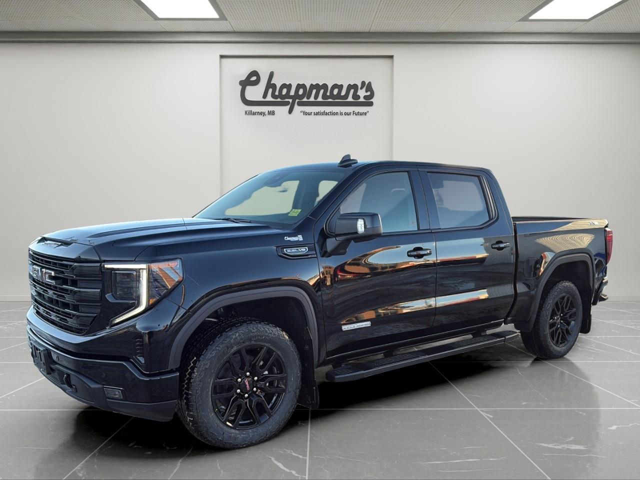 <p>The <strong>2026 GMC Sierra 1500 Elevation Crew Cab 4WD</strong> blends bold blacked-out styling, serious V8 capability, and advanced technology into one exceptionally well-equipped pickup. Finished in <strong>Onyx Black</strong> with a <strong>Jet Black interior</strong>, this Elevation stands out with aggressive design cues, off-road upgrades, and premium interior features that make it equally ready for work, towing, or daily driving.</p><p>Under the hood, the proven <strong>5.3L EcoTec3 V8</strong> paired with a smooth <strong>10-speed automatic transmission</strong> delivers confident power and refined performance. With the <strong>X31 Off-Road & Protection Package</strong>, this Sierra is built to handle rough terrain while maintaining the comfort and technology todays truck buyers expect.</p><h2><strong>Performance & Off-Road Capability</strong></h2><ul><li><p><strong>5.3L EcoTec3 V8 Engine</strong></p></li><li><p><strong>10-Speed Automatic Transmission</strong></p></li><li><p><strong>X31 Off-Road & Protection Package</strong>, including:</p><ul><li><p>Off-Road Suspension</p></li><li><p>Hill Descent Control</p></li><li><p>Skid Plates</p></li><li><p>Heavy-Duty Air Filter</p></li><li><p>2-Speed AutoTrac Transfer Case</p></li><li><p>Dual Exhaust System</p></li><li><p>20" All-Terrain Tires</p></li><li><p>Spray-On Bedliner</p></li><li><p>Rear Wheelhouse Liners</p></li></ul></li><li><p><strong>Automatic Locking Rear Differential</strong></p></li><li><p><strong>Trailer Brake Controller</strong></p></li><li><p><strong>Trailering Package</strong></p></li><li><p><strong>120V Power Outlets (Cab & Bed)</strong></p></li><li><p><strong>Engine Block Heater</strong></p></li></ul><h2><strong>Interior Comfort & Premium Features</strong></h2><p>The Elevation Premium Package brings luxury into the cabin:</p><ul><li><p><strong>Leather-Appointed Front Bucket Seats</strong></p></li><li><p><strong>Heated Front Seats</strong></p></li><li><p><strong>Heated, Wrapped Steering Wheel</strong></p></li><li><p><strong>10-Way Power Driver Seat</strong></p></li><li><p><strong>Dual-Zone Automatic Climate Control</strong></p></li><li><p><strong>Rear Sliding Power Window</strong></p></li><li><p><strong>Up-Level Rear Seat Storage Package</strong></p></li><li><p><strong>Wireless Charging</strong></p></li><li><p><strong>Universal Home Remote</strong></p></li></ul><h2><strong>Advanced Technology & Connectivity</strong></h2><p>A modern digital cockpit designed for confidence and convenience:</p><ul><li><p><strong>13.4" GMC Premium Infotainment Touchscreen</strong></p><ul><li><p>Google Built-In</p></li><li><p>Navigation Capability</p></li><li><p>Bluetooth</p></li></ul></li><li><p><strong>12.3" Digital Driver Information Centre</strong></p></li><li><p><strong>Wireless Apple CarPlay & Android Auto</strong></p></li><li><p><strong>Bose Premium Audio System</strong></p></li><li><p><strong>Remote Vehicle Start & Keyless Open/Start</strong></p></li><li><p><strong>In-Vehicle Trailering App & Hitch View</strong></p></li><li><p><strong>HD Surround Vision</strong></p></li><li><p><strong>Trailer Camera Provisions</strong></p></li><li><p><strong>Trailer Side Blind Zone Alert</strong></p></li><li><p><strong>OnStar Basics (Up to 8 Years)</strong></p></li><li><p><strong>SiriusXM with Trial</strong></p></li></ul><h2><strong>Safety & Driver Assistance</strong></h2><p>Standard <strong>GMC Pro Safety</strong>, plus additional advanced systems:</p><ul><li><p>Automatic Emergency Braking</p></li><li><p>Forward Collision Alert</p></li><li><p>Front Pedestrian Braking</p></li><li><p>Lane Keep Assist with Lane Departure Warning</p></li><li><p>Following Distance Indicator</p></li><li><p>IntelliBeam Auto High Beams</p></li><li><p>Adaptive Cruise Control</p></li><li><p>Front & Rear Park Assist</p></li><li><p>Rear Cross Traffic Braking</p></li><li><p>Rear Pedestrian Alert</p></li><li><p>Tire Pressure Monitoring with Tire Fill Alert</p></li><li><p>Teen Driver Mode</p></li></ul><h2><strong>Exterior Highlights</strong></h2><p>Bold Elevation styling with functional design:</p><ul><li><p><strong>LED Headlamps & LED Fog Lamps</strong></p></li><li><p><strong>EZ Lift, Power Lock & Release Tailgate</strong></p></li><li><p><strong>LED Cargo Area Lighting</strong></p></li><li><p><strong>Power-Adjustable Heated Mirrors</strong></p></li><li><p><strong>6" Black Assist Steps</strong> <em>(dealer installed)</em></p></li><li><p><strong>Perimeter Lighting</strong></p></li></ul><h3><strong>Why Choose This Sierra Elevation</strong></h3><p>With its <strong>5.3L V8</strong>, <strong>X31 Off-Road Package</strong>, <strong>Elevation Premium Package</strong>, <strong>Bose audio</strong>, and <strong>advanced trailering technology</strong>, this <strong>2026 Sierra 1500 Elevation 4WD</strong> delivers a perfect balance of rugged capability, modern tech, and premium comfort.</p><p>2 Year/24,000 kilometer* Complimentary Oil Changes (2 total)</p><p>3 Year/60,000 kilometer* Base Warranty Coverage</p><p>5 Year/100,000 kilometer* Powertrain Component Warranty Coverage</p><p>5 Year/100,000 kilometer* Courtesy Transportation and 24/7 Roadside Assistance</p><p>6 Year/160,000 kilometer* Sheet Metal (Rust Through) Perforation Warranty Coverage</p><p>*Whichever Comes First.</p><p>Price Includes HD Flaps & 6 Tube Steps.</p><p>Price Includes Dealer Fee.</p><p>Price Excludes PST & GST.</p><p>Financing Options Available, Call For More Details.</p> <p><strong>*While every reasonable effort is made to ensure the accuracy of this information, we are not responsible for any error or omissions contained on these pages. Please verify any information in question with Chapman Motors Ltd.</strong></p>