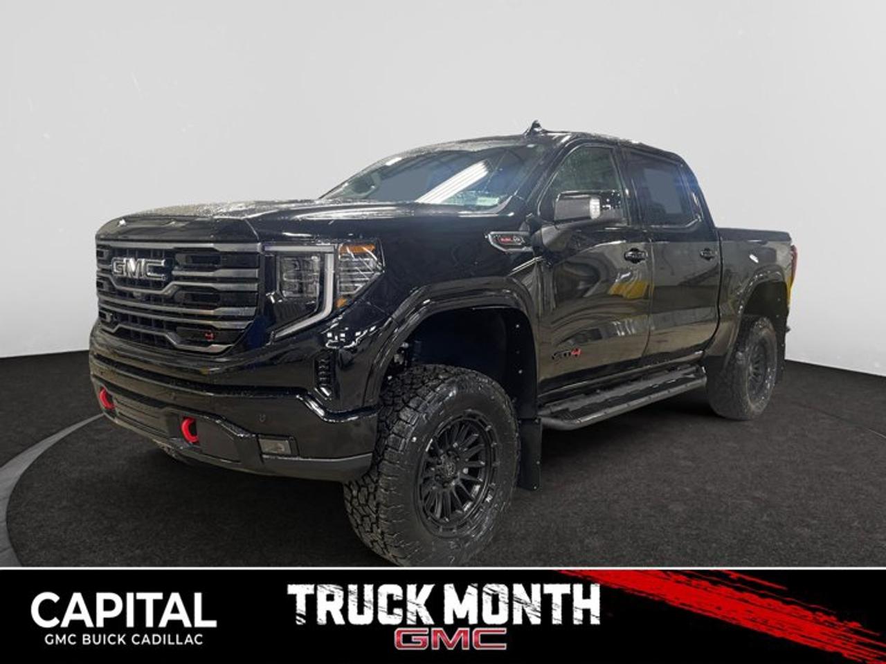 *This 2026 GMC Sierra 1500 AT4 Capital Custom lift truck in Onyx Black is equipped with a 4 BDS lift kit, black emblems, 20 Rhino wheels, Toyo tires, and Trigger flaps!*The Next Generation Sierra redefines what it means to drive a pickup. The redesigned for 2019 Sierra 1500 boasts all-new proportions with a larger cargo box and cabin. It also shaves weight over the 2018 model through the use of a lighter boxed steel frame and extensive use of aluminum in the hood, tailgate, and doors.To help improve the hitching and towing experience, the available ProGrade Trailering System combines intelligent technologies to offer an in-vehicle Trailering App, a companion to trailering features in the myGMC app and multiple high-definition camera views.GMC has altered the pickup landscape with groundbreaking innovation that includes features such as available Rear Camera Mirror and available Multicolour Heads-Up Display that puts key vehicle information low on the windshield. Innovative safety features such as HD Surround Vision and Lane Change Alert with Side Blind Zone alert will also help you feel confident and in control in the Next Generation Seirra.Key features of the Sierra AT4 include: 2-inch factory -installed suspension lift, Off-Road suspension with monotube shock absorbers, Distinct exterior design with black chrome accents, Exclusive athletic premium interior, Available mud terrain-rated Goodyear Wrangler DuraTrac tires, GMC MultiPro Tailgate, Available Head-Up Display with Off-Road Inclinometer, Available High Definition Surround Vision and standard TractionSelect System with available Off-Road mode, and Available 420 hp 6.2L V8 with all-new 10-speed automatic transmission.Check out this vehicles pictures, features, options and specs, and let us know if you have any questions. Helping find the perfect vehicle FOR YOU is our only priority.P.S...Sometimes texting is easier. Text (or call) 306-801-9090 for fast answers at your fingertips!Dealer License #914248Disclaimer: All prices are plus taxes & fees. See dealer for Details. Dealer Permit # 914248 See dealer for Details.
