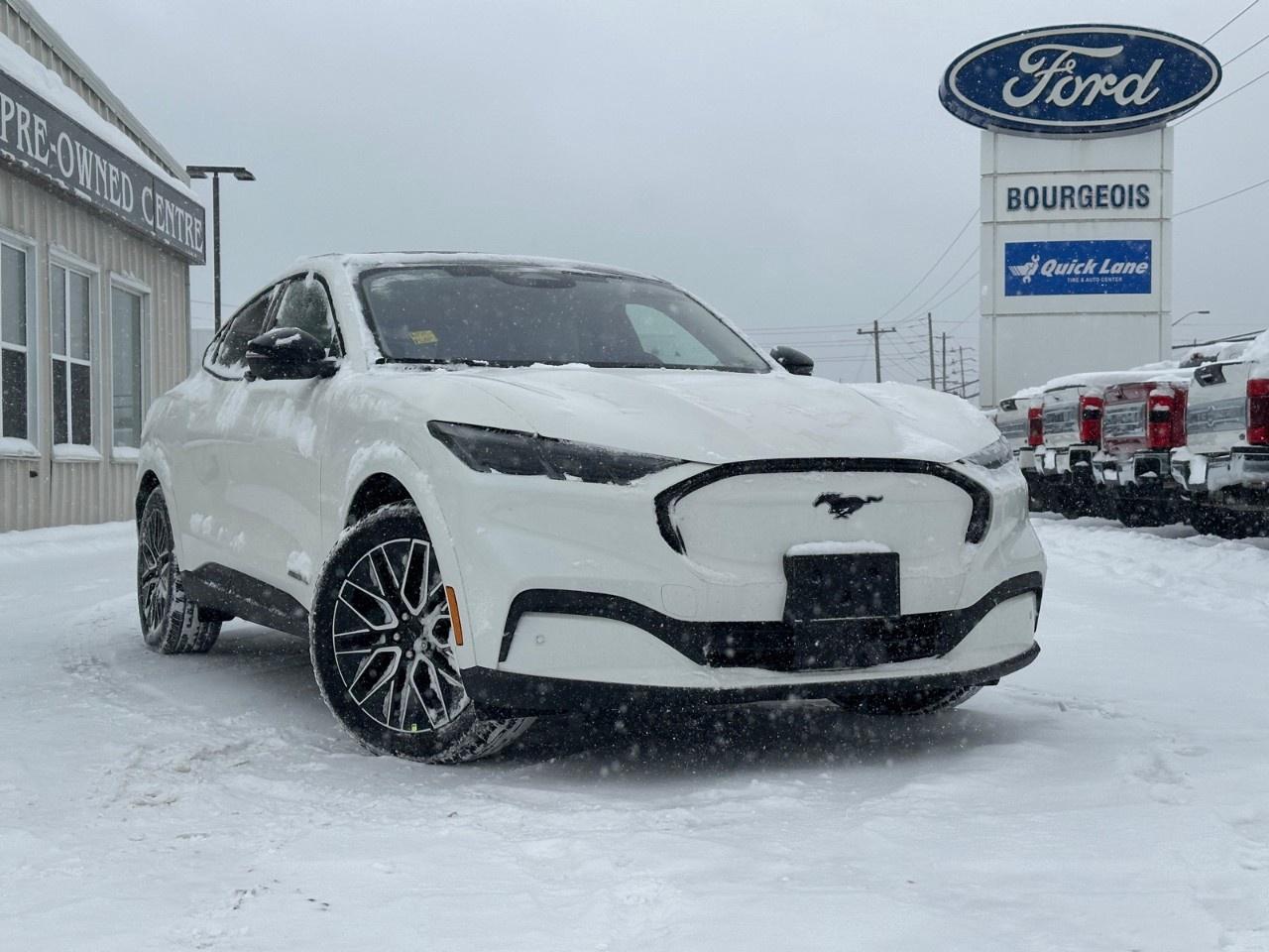 <p>Experience the 2025 Ford Mustang Mach-E in a classic White finish, equipped with a robust AWD drivetrain for confident handling in all conditions. This SUV's aerodynamic design is matched by a tasteful interior dressed in sophisticated Gray upholstery, promising comfort and style.</p><p>Step inside to enjoy a seamless blend of high-end materials and cutting-edge features. The Mustang Mach-E Premium edition comes with luxurious options such as heated and cooled front seats, a heated steering wheel, and a spacious cabin filled with innovative conveniences. The power seats and leatherette door trim add to the interior's refined ambiance.</p><p>Technological advancements are at the forefront with features like a state-of-the-art navigation system, smart device integration, and a user-friendly backup camera. Stay connected effortlessly with the built-in Wi-Fi hotspot and enjoy your journey with satellite radio or streaming through the Bluetooth connection. Safety is also paramount, with lane assist, adaptive cruise control, and parking sensors ensuring peace of mind on every drive.</p><p>This 2025 Ford Mustang Mach-E is perfect for the tech-savvy driver looking for a blend of performance, style, and versatility. Whether you're commuting in the city or exploring new horizons, this vehicle caters to all your needs. Contact our dealership today to learn more about this thrilling SUV and take it for a test drive.</p> <p><span style=color:rgb( 58 , 80 , 95 )>The discount shown on vehicle represents the </span><u>Cash Purchase</u><span style=color:rgb( 58 , 80 , 95 )> discount and is inclusive of all non-stackable and stackable cash purchase discounts from Ford of Canada and Bourgeois Motors Ltd. and is offered in lieu of sub-vented lease or finance rates. To get details on current discounts applicable to this and other vehicles in our inventory for Lease and Finance customer, see a member of our team. All offers for lease or finance are On Approved Credit (OAC).While every effort is made to ensure the accuracy of discounts and programs, programs are subject to change without notice </span><span style=color:rgb( 119 , 119 , 119 )>and may not be accurate or completely current. While every reasonable effort is made to ensure the accuracy of this data, we are not responsible for any errors or omissions contained on these pages.</span></p> <p><strong>Why Choose the Bourgeois Auto Group?</strong></p><p>For 80 years, Bourgeois Auto Group has been delivering exceptional automotive experiences. Our factor trained teams work to ensure you receive the shopping experience you deserve; whether you're looking for a new or new-to-you vehicle.</p><p>Shop 24/7 with our online showroom and chat service, ensuring convenience every step of the way. No hidden fees, full disclosure, and every pre-owned vehicle comes with a Carfax® report for peace of mind.</p><p>We offer a wide selection of pre-owned vehicles, all competitively priced using real-time market data. Get the best deal on your purchase and trade-in with our free Live Market Analysis report.</p><p>Looking to sell your car? We buy any make or modelno purchase required. Our simple to use online trade valuation tool will provide you with a clear, transparent selling experience whether you buy our car or not.</p><p>Backed by hundreds dedicated employees across 4 convenient locations, were here to meet all your automotive needs. Visit us in Midland or Parry Sound and explore our inventory or schedule your next service today.</p> <p><strong>Financing Your Next Vehicle with Bourgeois Motors Ford in Midland:</strong></p><p>At Bourgeois Motors Ford, we make financing your next vehicle simple and stress-free! Our team works with trusted lenders to find flexible options tailored to your budget. Drive away with confidenceapply today!</p><p>Take advantage of our online pre-qualification tool, backed by Equifax and TD Bank to find the payment that works for you. Simply <a href=https://www.bourgeoismotors.com/free-credit-check/ rel=nofollow><strong>CLICK HERE</strong></a><strong> </strong>to use our secure online credit tool with no impact to your credit.</p>