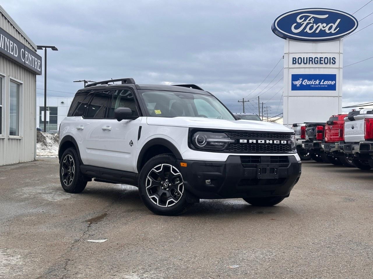 <p>Experience the thrill of the new 2025 Ford Bronco Sport Outer Banks 4x4, dressed elegantly in a White exterior with a contrasting Blue interior. This SUV is designed for those who crave adventure with its robust 4x4 drivetrain and impeccable handling.</p><p>On the outside, the Outer Banks trim exudes sophistication with alloy wheels and sleek lines, while the interior is an inviting oasis featuring heated seats and a heated steering wheel for ultimate comfort. The combination of style and functionality ensures you feel as good as you look while on the road.</p><p>Equipped with cutting-edge technology, this Bronco Sport offers smart device integration, satellite radio, and a crystal-clear backup camera. Safety is a priority with advanced features like lane assist, adaptive cruise control, and parking sensors, ensuring peace of mind on every journey.</p><p>Perfect for families and adventure enthusiasts alike, this SUV merges practicality with luxury. Don't miss out on the opportunity to own a vehicle that perfectly balances style, power, and technology. Contact us today to learn more and schedule a test drive of your new Ford Bronco Sport!</p> <p><span style=color:rgb( 58 , 80 , 95 )>The discount shown on vehicle represents the </span><u>Cash Purchase</u><span style=color:rgb( 58 , 80 , 95 )> discount and is inclusive of all non-stackable and stackable cash purchase discounts from Ford of Canada and Bourgeois Motors Ltd. and is offered in lieu of sub-vented lease or finance rates. To get details on current discounts applicable to this and other vehicles in our inventory for Lease and Finance customer, see a member of our team. All offers for lease or finance are On Approved Credit (OAC).While every effort is made to ensure the accuracy of discounts and programs, programs are subject to change without notice </span><span style=color:rgb( 119 , 119 , 119 )>and may not be accurate or completely current. While every reasonable effort is made to ensure the accuracy of this data, we are not responsible for any errors or omissions contained on these pages.</span></p> <p><strong>Why Choose the Bourgeois Auto Group?</strong></p><p>For 80 years, Bourgeois Auto Group has been delivering exceptional automotive experiences. Our factor trained teams work to ensure you receive the shopping experience you deserve; whether you're looking for a new or new-to-you vehicle.</p><p>Shop 24/7 with our online showroom and chat service, ensuring convenience every step of the way. No hidden fees, full disclosure, and every pre-owned vehicle comes with a Carfax® report for peace of mind.</p><p>We offer a wide selection of pre-owned vehicles, all competitively priced using real-time market data. Get the best deal on your purchase and trade-in with our free Live Market Analysis report.</p><p>Looking to sell your car? We buy any make or modelno purchase required. Our simple to use online trade valuation tool will provide you with a clear, transparent selling experience whether you buy our car or not.</p><p>Backed by hundreds dedicated employees across 4 convenient locations, were here to meet all your automotive needs. Visit us in Midland or Parry Sound and explore our inventory or schedule your next service today.</p> <p><strong>Financing Your Next Vehicle with Bourgeois Motors Ford in Midland:</strong></p><p>At Bourgeois Motors Ford, we make financing your next vehicle simple and stress-free! Our team works with trusted lenders to find flexible options tailored to your budget. Drive away with confidenceapply today!</p><p>Take advantage of our online pre-qualification tool, backed by Equifax and TD Bank to find the payment that works for you. Simply <a href=https://www.bourgeoismotors.com/free-credit-check/ rel=nofollow><strong>CLICK HERE</strong></a><strong> </strong>to use our secure online credit tool with no impact to your credit.</p> <p><strong>This Is a Dealer Demonstrator. </strong>Experience exceptional value with Bourgeois Motors Fords executive demos. These are like-new vehicles with low mileage, premium features, and significant savings. Drive away with confidence, backed by the balance of factory warranties and our commitment to quality. Its a great way to own a new Ford.</p>