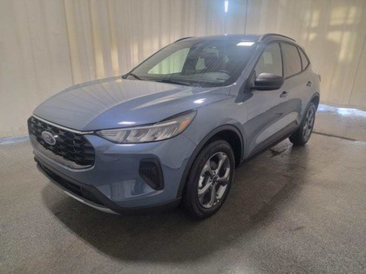 This all-new 2026 Escape ST-Line 301A looks absolutely stunning in Vapor Blue Metallic. This 5-passenger all-wheel drive crossover comes equipped with the 2.5L iVCT Atkinson Cycle I-4 Hybrid engine. This remarkable vehicle is rated for an astonishing combined fuel economy of 6.0 L/100 KM (47 Miles/gallon)!

Key Features:
All Weather Package 
Heated Front Seats
Heated Premium Wrapped Sport Steering Wheel
Heated Mirrors
Remote Start
18 Rock Metallic Painted Aluminum Wheels
8-Way Power Driver Seat
LED Taillamps
8 Instrument panel cluster
Manual Liftgate
Privacy Glass
17 Shadow Silver Painted Aluminum Wheels
Power Windows
LED Headlamps
Ford Co-Pilot360
SYNC® 4 W/8 LCD Capacitive Touchscreen
Wireless Apple CarPlay® and Android Auto Compatibility
Engine Block Heater

Bennett Dunlop Ford, proudly serving Regina for over 40 years, is conveniently located at 770 Broad Street. With over 3,500 Google reviews, our reputation reflects our commitment to providing a fast, easy, and enjoyable vehicle-buying experience. We eliminate the hassle with no admin or documentation fees, transparent upfront pricing lets you shop with total confidence. But were more than just a dealershipwere driven to make a difference by supporting local community initiatives and events that matter to you. Visit Bennett Dunlop Ford today and experience why were Reginas trusted choice for quality vehicles, exceptional service, and a genuine commitment to driving change in our community!
