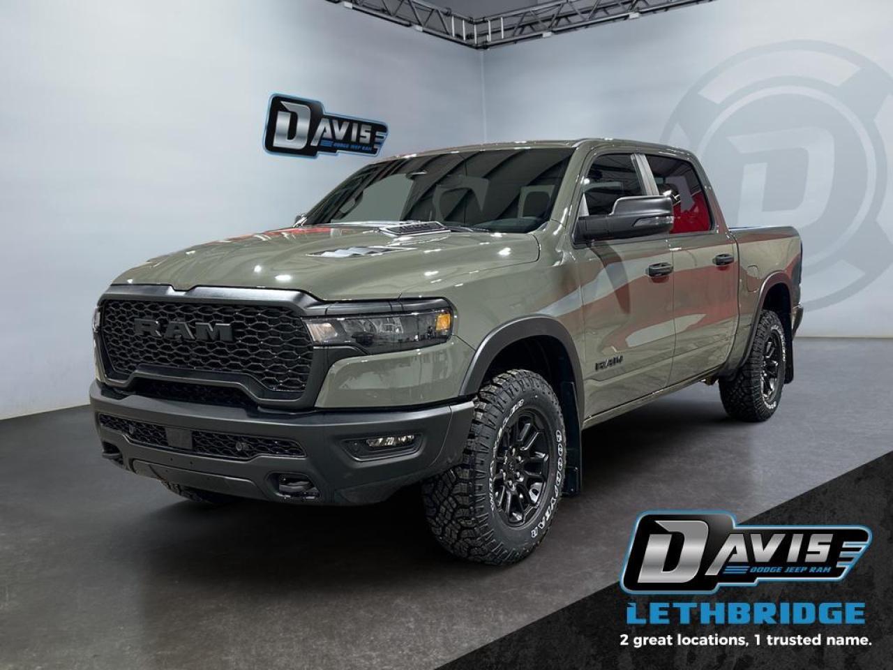 <b>Off-Road Suspension, Navigation, Apple CarPlay and Android Auto, Blind Spot Monitoring!<br /> <br /></b><br /> <br /> <br />The 2026 Ram 1500 Rebel in Canyon Lake combines aggressive off-road capability with refined comfort. Powered by a 3.0L I6 Hurricane Twin-Turbo engine and an 8-speed automatic transmission, this 4x4 crew cab features raised ride height, E-locker rear axle, off-road wheel flares, sport performance hood, dual exhaust with black tips, and black grille and bumpers for a bold, rugged look.<br /><br />Inside, it offers heated cloth/vinyl bucket seats, full-length upgraded floor console, 12 Uconnect 5 NAV touchscreen, Apple CarPlay, Android Auto, and GPS navigation. The cabin also includes power 8-way driver seat, rear 60/40 folding seats, premium storage compartments, and dual-zone climate control for comfort and convenience.<br /><br />Safety is enhanced with Adaptive Cruise Control with Stop & Go, Blind Spot and Cross Path Detection, ParkView rear camera, Pedestrian Emergency Braking, and Active Lane Management. Additional features include remote start, 18 painted black wheels, Mopar rubber floor mats, capless fuel fill, and towing-ready class IV receiver hitch.<br /> <br />To apply right now for financing use this link: <a href=https://lethbridge.davisdodge.ca/free-credit-check/ target=_blank rel=nofollow noopener noreferrer>https://lethbridge.davisdodge.ca/free-credit-check/</a><br /><br /> <br /><br />As a premier Chrysler, Dodge, Jeep and RAM dealership, Davis Dodge proudly offers an extensive selection of new and used vehicles to meet every drivers needs. Customers across Lethbridge, Fort Macleod, Taber, Claresholm, Coaldale, and beyond trust us for daily vehicle specials, certified service and parts, and a seamless online inventory experience. <br /><br /> With competitive financing options and expert support, we make car buying easy and enjoyable. <br /><br /> Ready to hit the road? Schedule your test drive today at Davis Dodge, your trusted Chrysler, Dodge, Jeep and RAM dealer in Lethbridge, Alberta.<br /><br /> Vehicle pricing offer shown expires 2026-03-31. <br /> Come by and check out our fleet of 70+ used cars and trucks and 130+ new cars and trucks for sale in Lethbridge. o~o