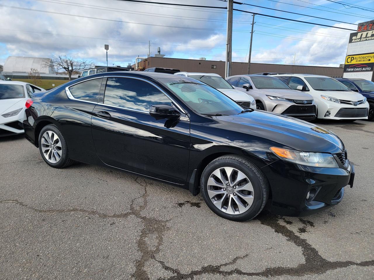 <p data-start=61 data-end=116><strong data-start=61 data-end=116>2015 Honda Accord EX-L w/ Navigation &ndash; Fully Loaded</strong></p><p data-start=118 data-end=343>Super clean 2015 Honda Accord EX-L with Navigation, loaded with every option Honda offered that year. Smooth, reliable, and known for excellent fuel economy and long-term durability. Clean inside and out &mdash; drives beautifully.</p><p data-start=345 data-end=358><strong data-start=345 data-end=358>Features:</strong></p><ul data-start=359 data-end=874><li data-start=359 data-end=381><p data-start=361 data-end=381>2.4L i-VTEC engine</p></li><li data-start=382 data-end=408><p data-start=384 data-end=408>Automatic transmission</p></li><li data-start=409 data-end=437><p data-start=411 data-end=437>Factory Honda Navigation</p></li><li data-start=438 data-end=458><p data-start=440 data-end=458>Leather interior</p></li><li data-start=459 data-end=476><p data-start=461 data-end=476>Power sunroof</p></li><li data-start=477 data-end=499><p data-start=479 data-end=499>Heated front seats</p></li><li data-start=500 data-end=517><p data-start=502 data-end=517>Backup camera</p></li><li data-start=518 data-end=549><p data-start=520 data-end=549>LaneWatch blind-spot camera</p></li><li data-start=550 data-end=574><p data-start=552 data-end=574>Bluetooth hands-free</p></li><li data-start=575 data-end=604><p data-start=577 data-end=604>Dual-zone climate control</p></li><li data-start=605 data-end=641><p data-start=607 data-end=641>Power driver and passenger seats</p></li><li data-start=642 data-end=666><p data-start=644 data-end=666>Premium audio system</p></li><li data-start=667 data-end=684><p data-start=669 data-end=684>Keyless entry</p></li><li data-start=685 data-end=706><p data-start=687 data-end=706>Push-button start</p></li><li data-start=707 data-end=739><p data-start=709 data-end=739>Remote starter (if equipped)</p></li><li data-start=740 data-end=756><p data-start=742 data-end=756>Alloy wheels</p></li><li data-start=757 data-end=771><p data-start=759 data-end=771>Fog lights</p></li><li data-start=772 data-end=814><p data-start=774 data-end=814>Steering-wheel audio & cruise controls</p></li><li data-start=815 data-end=826><p data-start=817 data-end=826>USB/AUX</p></li><li data-start=827 data-end=841><p data-start=829 data-end=841>Eco Assist</p></li><li data-start=842 data-end=874><p data-start=844 data-end=874>Super clean &mdash; well cared for</p></li></ul><p data-start=876 data-end=1036>The EX-L w/ Navi is the top-tier comfort and tech package &mdash; perfect blend of luxury, reliability, and fuel efficiency. Drives tight, smooth, and ready to enjoy.</p><p><strong>Additional Certification Cost</strong>: The full certification cost for this vehicle is <strong>$790 + HST</strong>.</p><p><strong>What&rsquo;s Included with Certification</strong>:</p><ul><li>The vehicle will be delivered with a <strong>valid safety certification</strong> and a <strong>36-day safety item warranty</strong> for your peace of mind.</li><li>A <strong>fresh oil change</strong> will be performed, and all fluids will be topped up.</li><li>The vehicle will be <strong>professionally detailed</strong>, ensuring it looks and feels like new when you pick it up.</li></ul><p>At <strong>Twin Oaks Auto</strong>, we are committed to providing a <strong>hassle-free car buying experience</strong>. From your first inquiry to driving off in your new car, our goal is to get you on the road quickly and stress-free!</p><p><strong>Financing Options Available!</strong><br>Flexible financing options are available to suit your needs. Contact us for more details.</p><p><strong>Contact Us Today</strong>:<br>📞 <strong>Call Us</strong>: 905-339-3330<br>📍 <strong>Location</strong>: 2470 Royal Windsor Drive, Oakville, Ontario, L6J 7Y2</p><p><br>(Conveniently located between Ford Drive and Winston Churchill Blvd.)</p><p><strong>More Information</strong>:<br>Visit our website at <strong><a href=http://www.twinoaksauto.com>TwinOaksAuto.com</a></strong> to view additional pictures, explore our inventory, and access CARFAX reports.</p><p>&nbsp;</p>