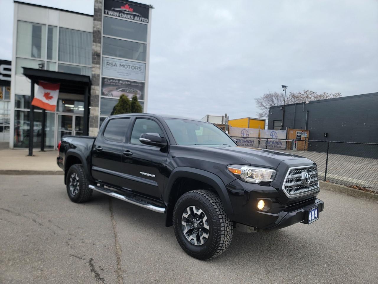 <p data-start=60 data-end=113><strong data-start=60 data-end=113>2017 Toyota Tacoma TRD Off-Road &ndash; Automatic &ndash; 4x4</strong></p><p data-start=115 data-end=375>Super clean 2017 Tacoma TRD Off-Road with automatic transmission and all the right features. Legendary Toyota reliability, rugged TRD capability, and one of the most sought-after mid-size trucks on the market. Drives tight, solid, and extremely well cared for.</p><p data-start=377 data-end=390><strong data-start=377 data-end=390>Features:</strong></p><ul data-start=391 data-end=961><li data-start=391 data-end=409><p data-start=393 data-end=409>3.5L V6 engine</p></li><li data-start=410 data-end=436><p data-start=412 data-end=436>Automatic transmission</p></li><li data-start=437 data-end=444><p data-start=439 data-end=444>4x4</p></li><li data-start=445 data-end=469><p data-start=447 data-end=469>TRD Off-Road package</p></li><li data-start=470 data-end=510><p data-start=472 data-end=510>Crawl Control & Multi-Terrain Select</p></li><li data-start=511 data-end=543><p data-start=513 data-end=543>Bilstein off-road suspension</p></li><li data-start=544 data-end=573><p data-start=546 data-end=573>Locking rear differential</p></li><li data-start=574 data-end=591><p data-start=576 data-end=591>Backup camera</p></li><li data-start=592 data-end=615><p data-start=594 data-end=615>Touchscreen display</p></li><li data-start=616 data-end=648><p data-start=618 data-end=648>Bluetooth audio & hands-free</p></li><li data-start=649 data-end=688><p data-start=651 data-end=688>Navigation (if equipped via Entune)</p></li><li data-start=689 data-end=706><p data-start=691 data-end=706>Keyless entry</p></li><li data-start=707 data-end=742><p data-start=709 data-end=742>Push-button start (if equipped)</p></li><li data-start=743 data-end=759><p data-start=745 data-end=759>Heated seats</p></li><li data-start=760 data-end=794><p data-start=762 data-end=794>Leather-wrapped steering wheel</p></li><li data-start=795 data-end=811><p data-start=797 data-end=811>Alloy wheels</p></li><li data-start=812 data-end=826><p data-start=814 data-end=826>Fog lights</p></li><li data-start=827 data-end=842><p data-start=829 data-end=842>Tow package</p></li><li data-start=843 data-end=856><p data-start=845 data-end=856>Bed liner</p></li><li data-start=857 data-end=880><p data-start=859 data-end=880>Sliding rear window</p></li><li data-start=881 data-end=918><p data-start=883 data-end=918>Power windows, locks, and mirrors</p></li><li data-start=919 data-end=961><p data-start=921 data-end=961>Steering-wheel audio & cruise controls</p></li></ul><p data-start=963 data-end=1089>Solid truck, clean condition, and ready for work, daily driving, or weekend adventures. Hard to find a TRD Off-Road this nice.</p><p><strong>Additional Certification Cost</strong>: The full certification cost for this vehicle is <strong>$790 + HST</strong>.</p><p><strong>What&rsquo;s Included with Certification</strong>:</p><ul><li>The vehicle will be delivered with a <strong>valid safety certification</strong> and a <strong>36-day safety item warranty</strong> for your peace of mind.</li><li>A <strong>fresh oil change</strong> will be performed, and all fluids will be topped up.</li><li>The vehicle will be <strong>professionally detailed</strong>, ensuring it looks and feels like new when you pick it up.</li></ul><p>At <strong>Twin Oaks Auto</strong>, we are committed to providing a <strong>hassle-free car buying experience</strong>. From your first inquiry to driving off in your new car, our goal is to get you on the road quickly and stress-free!</p><p><strong>Financing Options Available!</strong><br />Flexible financing options are available to suit your needs. Contact us for more details.</p><p><strong>Contact Us Today</strong>:<br />📞 <strong>Call Us</strong>: 905-339-3330<br />📍 <strong>Location</strong>: 2470 Royal Windsor Drive, Oakville, Ontario, L6J 7Y2</p><p><br />(Conveniently located between Ford Drive and Winston Churchill Blvd.)</p><p><strong>More Information</strong>:<br />Visit our website at <strong><a href=http://www.twinoaksauto.com>TwinOaksAuto.com</a></strong> to view additional pictures, explore our inventory, and access CARFAX reports.</p><p>&nbsp;</p>