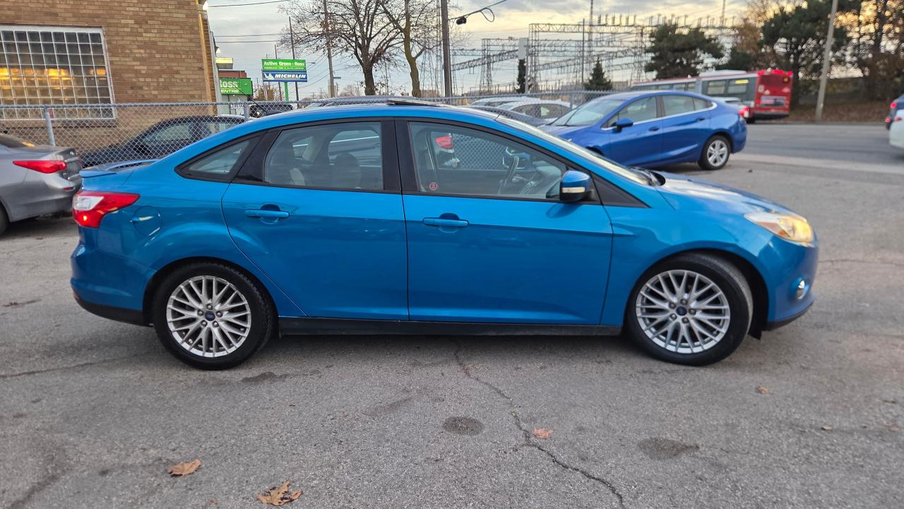 2014 Ford Focus 4dr Sdn SE w/P-Moon/Remote start - Photo #5