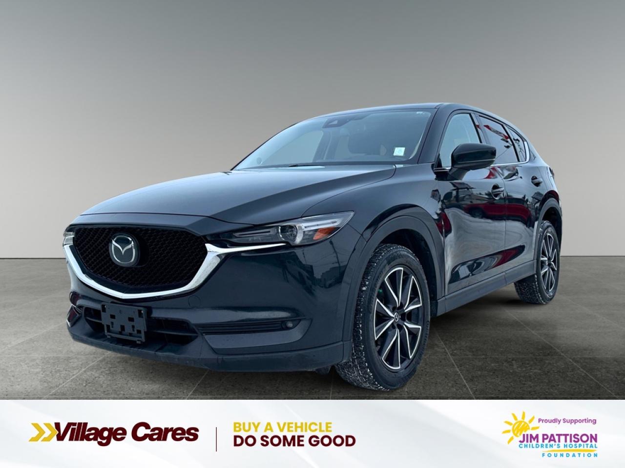 <b>Leather Seats, Premium Audio, Power Liftgate, Navigation, Heated Seats, Heated Steering Wheel, Aluminum Wheels, Blind Spot Monitoring, Rear View Camera, MAZDA CONNECT, Steering Wheel Audio Control, Remote Keyless Entry, Low Speed Brake Assist, Power Seat</b><br> <br> We sell high quality used cars, trucks, vans, and SUVs in Saskatoon, Regina, Prince Albert and overall Saskatchewan area.<br> <br>   The crossover segment is crowded, but the 2018 Mazda CX-5 sets itself apart by offering great styling in an tremendous value. This  2018 Mazda CX-5 is for sale today. <br> <br>The midsize crossover segment is packed with options, however there is one SUV that sets itself apart with phenomenal styling, a well tuned chassis and more features than you know what do with. The CX-5 looks and feels far more expensive than what it is, thanks to Mazdas Kodo design language, which gives it design lines youd expect from an expensive crossover. Inside, the cabin is filled in soft touch materials and is packed with high tech features. The hatch opens to plenty of cargo space for whatever you need to fill it with. This  SUV has 228,187 kms. Its  black in colour  . It has a 6 speed automatic transmission and is powered by a  187HP 2.5L 4 Cylinder Engine.  <br> <br> Our CX-5s trim level is GT. This top of the line trim comes with a power liftgate, heated leather seats, LED front headlights, larger aluminum wheels, a 7 inch colour touch screen with MAZDA CONNECT, Bose premium audio system and a rear view camera. Additional features include advanced blind spot monitoring, smart city brake support, remote keyless entry with push button start, cruise control and a heated-leather steering wheel. For the ultimate in luxury, this GT trim also comes with a power sunroof, fully automatic and directionally adaptive headlights, dual zone automatic climate control, hands free proximity keys and built in navigation.<br> <br/><br><h3 style=margin-top: -20px;>More about the Dealership:</h3><br>

Looking for a <i>used car dealership in Saskatchewan</i> you can truly count on? With over <b>50 years in the auto industry</b>, weve earned a solid reputation built on trust, quality service, and lasting customer relationships.<br><br>

Our team is here to guide you through every step of your car-buying journey - from car-buying expert advice to <b>flexible financing</b> through our <b>Credit Repair program</b>. With over 100 well-priced used vehicles in stock, we make it easy for you to drive home happy. We offer <b>Delivery</b> anywhere in Saskatchewan.<br><br>

As the trusted used car dealership in Saskatoon, Regina, Prince Albert; we are committed to an excellent customer experience. <br><br> o~o