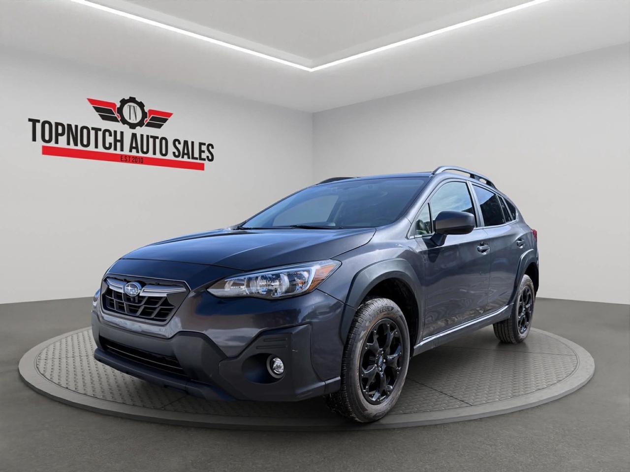 <h2>2023 Subaru Crosstrek AWD for Sale</h2><p><br></p><p><strong>Now Available at Topnotch Auto Sales Inc</strong></p><p><br></p><p>Discover the perfect balance of versatility, reliability, and advanced capability with the 2023 Subaru Crosstrek AWD. This compact SUV is expertly engineered for those with active lifestyles, offering exceptional performance no matter where your journey takes you. Featuring Subarus renowned Symmetrical All-Wheel Drive, this Crosstrek ensures confident handling on city streets, rugged backroads, and snowy highways alike. Blending robust engineering with modern technology and comfort, its the ultimate companion for urban commutes and weekend getaways.</p><p><br></p><p><br></p><h2>Performance & Capability</h2><p><br></p><p>The 2023 Subaru Crosstrek is built to tackle any weather or road condition with its industry-leading <strong>Symmetrical All-Wheel Drive</strong> system, providing maximum traction and stability whether the roads are dry, wet, or snow-covered. The responsive automatic transmission offers smooth acceleration and nimble maneuverability, while impressive fuel efficiency keeps your adventures affordable. High ground clearance and a versatile suspension system allow this compact SUV to easily handle city potholes and light trails, ensuring everyday comfort and capability.</p><p><br></p><p><br></p><h2>Interior Comfort & Features</h2><p><br></p><p>Inside, the Crosstrek offers a thoughtfully designed cabin that prioritizes comfort and practicality. Enjoy premium touches and features that enhance every drive, including:</p><p><br></p><ul><li><br></li><li>Heated front seats to keep you warm during chilly Canadian winters</li><li><br></li><li>Seating for up to five adults with generous legroom</li><li><br></li><li>Quality materials and durable surfaces built for daily wear</li><li><br></li><li>Convenient power windows, door locks, and side mirrors</li><li><br></li><li>Flexible fold-down rear seats, maximizing cargo space for gear and groceries</li><li><br></li><li>Ergonomic layout designed for optimal driver comfort and visibility</li><li><br></li></ul><p><br></p><p>The refined interior of this Crosstrek seamlessly blends everyday convenience with enduring Subaru durability.</p><p><br></p><p><br></p><h2>Technology & Connectivity</h2><p><br></p><p>Stay connected and entertained on every drive with a suite of modern technology, including:</p><p><br></p><ul><li><br></li><li>Apple CarPlay® and Android Auto compatibility for seamless smartphone integration</li><li><br></li><li>Intuitive touchscreen infotainment system</li><li><br></li><li>Bluetooth hands-free calling and wireless audio streaming</li><li><br></li><li>Rear vision camera to simplify parking and improve safety</li><li><br></li><li>Steering wheel-mounted audio and phone controls</li><li><br></li><li>Multiple USB charging ports to keep all devices powered</li><li><br></li></ul><p><br></p><p>Wherever the road leads, experience convenient connectivity and smart features designed for todays active lifestyles.</p><p><br></p><p><br></p><h2>Safety & Peace of Mind</h2><p><br></p><p>Safety is a Subaru trademark, and the 2023 Crosstrek is engineered with your protection in mind. Key safety features include:</p><p><br></p><ul><li><br></li><li>Rear backup camera for confident reversing</li><li><br></li><li>Advanced traction control and stability management</li><li><br></li><li>Comprehensive anti-lock braking system (ABS)</li><li><br></li><li>Multiple airbags for complete occupant protection</li><li><br></li><li>Tire pressure monitoring system to keep you safe on the go</li><li><br></li></ul><p><br></p><p>Drive with assurance, knowing your Crosstrek is equipped to safeguard you and your loved ones.</p><p><br></p><p><br></p><h2>Exterior & Utility</h2><p><br></p><ul><li><br></li><li>Sleek alloy wheels that enhance both style and performance</li><li><br></li><li>Integrated roof rails for extra cargo capacityperfect for bikes, skis, or camping gear</li><li><br></li><li>Rugged yet stylish compact SUV design</li><li><br></li><li>Elevated ride height, boosting your confidence on challenging roads and in tough weather</li><li><br></li></ul><p><br></p><p>This Crosstrek is the ideal fusion of utility and styleready for any adventure or daily routine.</p><p><br></p><p><br></p><h2>Vehicle Condition</h2><p><br></p><p>This 2023 Subaru Crosstrek AWD is in outstanding, non-smoking condition, meticulously detailed both inside and out. Fully inspected for your peace of mind, it exemplifies the care and pride of its previous ownershipready for you to make it your own.</p><p><br></p><p><br></p><h2>Why Choose Topnotch Auto Sales?</h2><p><br></p><p>At Topnotch Auto Sales Inc, our priority is delivering dependable pre-owned vehicles backed by exceptional customer care. Our knowledgeable team guides you through a transparent, stress-free buying processensuring you drive away happy and confident.</p><p><br></p><p><br></p><h2>Flexible Financing Solutions</h2><p><br></p><p>We specialize in fast credit approvals for <strong>all credit types</strong>, including bad credit, no credit, new credit, or past financial challenges. Enjoy the convenience of same-day approvals and flexible down payment options to fit your budget.</p><p><br></p><p><br></p><h2>Certification Option</h2><p><br></p><p>For extra confidence, certify your 2023 Subaru Crosstrek for <strong>just $799</strong>. This guarantees the vehicle meets all Ontario safety requirements, providing you with additional peace of mind and security on the road.</p><p><br></p><p><br></p><h2>OMVIC Compliance</h2><p><br></p><p><strong>Important:</strong> All uncertified vehicles are sold asis, in accordance with OMVIC regulations. Certification is required for road use, and our team is ready to assist you with the process from start to finish.</p><p><br></p><p><br></p><p>Backed by over <strong>14 years of industry expertise</strong>, Topnotch Auto Sales Inc is renowned for integrity, quality vehicles, and superior customer service. Make us your first choice for a hassle-free vehicle buying experience in <strong>{location}</strong>.</p><p><br></p><p><br></p><p> <strong>Visit Us:</strong></p><p><br></p><p>5455 Steeles Ave W, North York, ON M9L 1S7</p><p><br></p><p> <strong>Call or Text:</strong></p><p><br></p><p>416-879-7113</p>