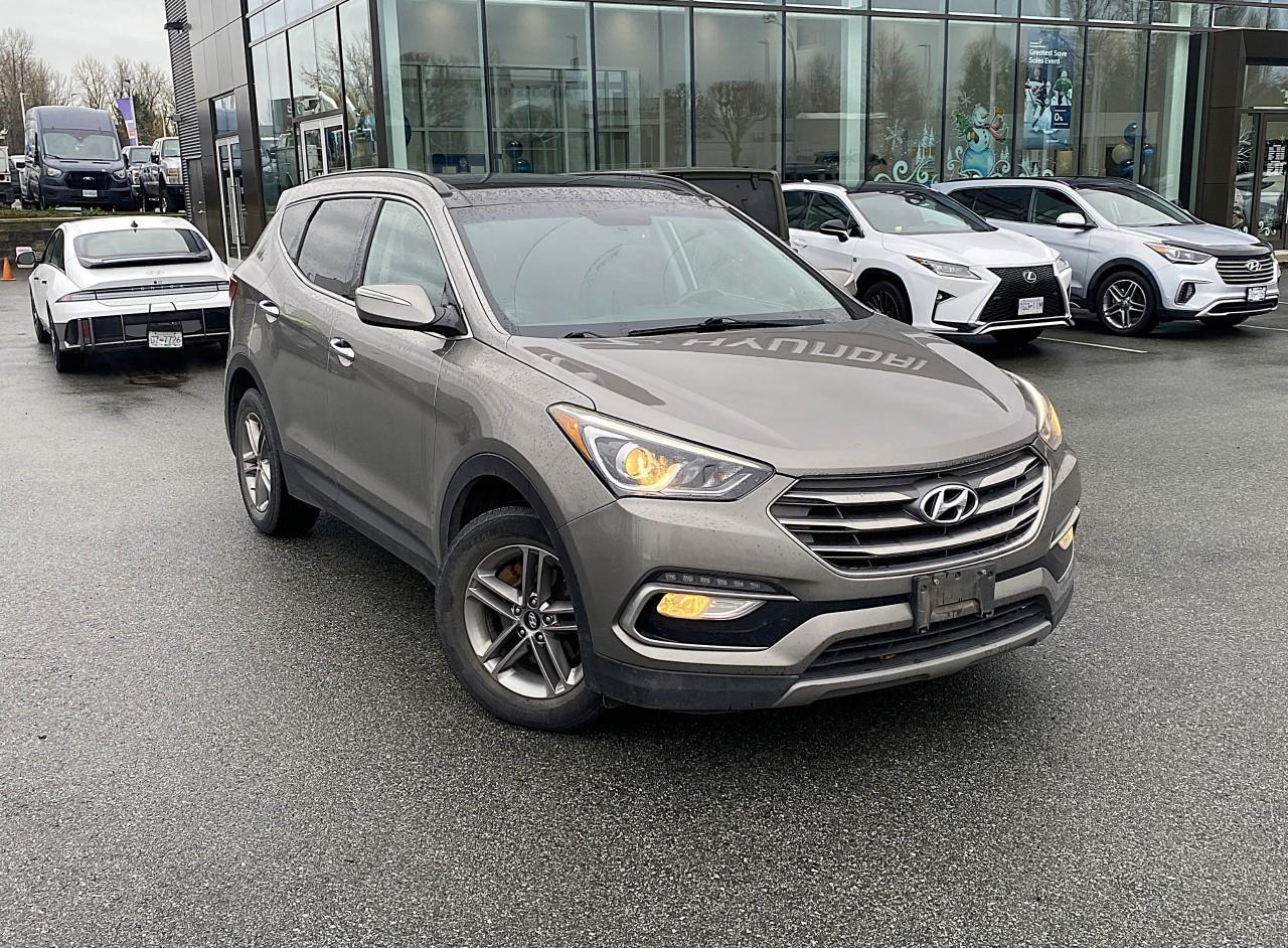 <p><strong>Versatile, comfortable, and family-ready  this used 2017 Hyundai Santa Fe Sport SE delivers reliable performance, modern features, and everyday practicality in a stylish midsize SUV. This used 2017 Hyundai Santa Fe Sport </strong><span style=color:rgb( 0 , 0 , 0 )>is available now at </span><strong>Abbotsford Hyundai</strong><span style=color:rgb( 0 , 0 , 0 )>, your trusted dealership in </span><strong>Abbotsford, British Columbia</strong><span style=color:rgb( 0 , 0 , 0 )>.</span></p><p>Powered by a 2.4L 4-cylinder engine paired with a 6-speed automatic transmission, the Santa Fe Sport SE offers <strong>185 horsepower</strong> and smooth efficiency. With available All-Wheel Drive, its ready for Canadian winters, long road trips, and daily commuting.</p><p>Inside, the SE trim surrounds you with comfort and convenience, including heated front seats, premium cloth upholstery, dual-zone climate control, and a power-adjustable drivers seat. The cabin features a 7-inch touchscreen infotainment system with Apple CarPlay® and Android Auto, Bluetooth® connectivity, and a rearview camera for seamless integration. Ample cargo space and split-folding rear seats make it easy to carry everything from groceries to gear for weekend adventures.</p><p>Safety is supported by Electronic Stability Control, Traction Control System, Anti-lock Braking System, and multiple airbags. With refined ride quality, spacious interior, and dependable performance, the 2017 Santa Fe Sport SE is a smart choice for families and commuters alike.</p><p><strong>Smart features. Everyday versatility. Proven reliability.</strong> The 2017 Hyundai Santa Fe Sport SE is built to keep up with your lifestyle. <span style=color:rgb( 0 , 0 , 0 )>This vehicle has undergone a </span><strong>comprehensive multi-point inspection</strong><span style=color:rgb( 0 , 0 , 0 )>by our certified technicians. Ask us about </span><strong>extended warranty options</strong><span style=color:rgb( 0 , 0 , 0 )>, </span><strong>vehicle history reports</strong><span style=color:rgb( 0 , 0 , 0 )>, and </span><strong>flexible financing plans</strong><span style=color:rgb( 0 , 0 , 0 )>tailored to your needs.</span></p> <p>All Abbotsford Hyundai pre-owned vehicles come complete with the remaining Manufacturers Warranty plus a vehicle safety report and a CarFax history report. Abbotsford Hyundai is a BBB accredited pre-owned car dealership, serving the Fraser Valley and our friends in Surrey, Langley and surrounding Lower Mainland areas. We are your Friendly Fraser Valley car dealer. We are located at 30250 Automall Drive in Abbotsford. Call or email us to schedule a test drive.</p><p>*All Sales are subject to Taxes, $799 Doc fee, $87 Fuel Surcharge and up to $1,299 Hyundai Certified Fee for CPO vehicles. Advertised price is finance price, cash price may differ. Refer to dealer website for most up to date information.</p>