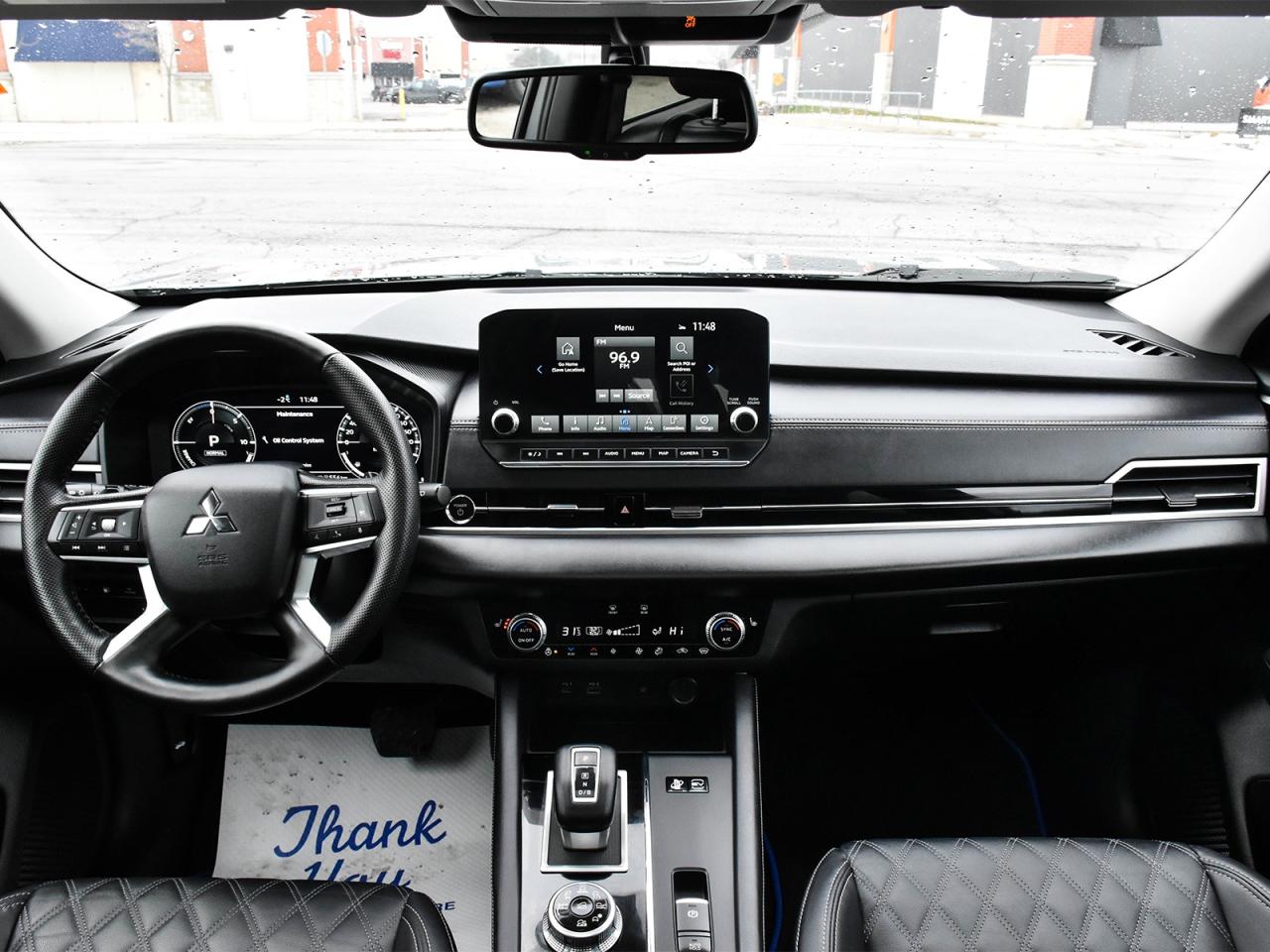 2024 Mitsubishi Outlander PHEV Awd , very low km, heater front seats ,alloy rim . Photo