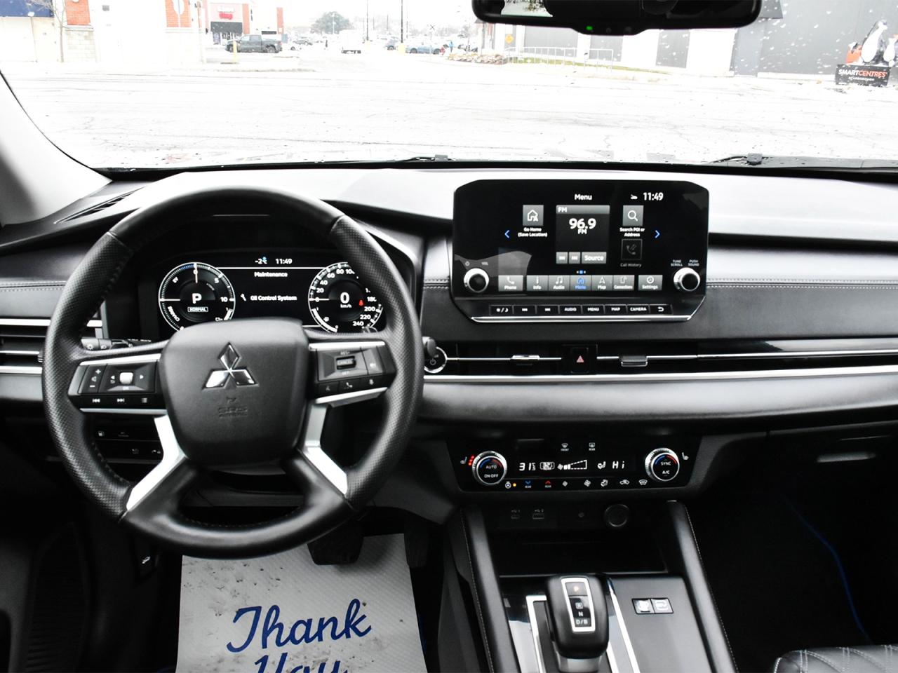 2024 Mitsubishi Outlander PHEV Awd , very low km, heater front seats ,alloy rim . Photo