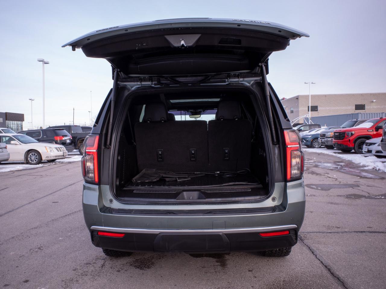 2023 Chevrolet Suburban Premier- Power Sliding Center Console Photo