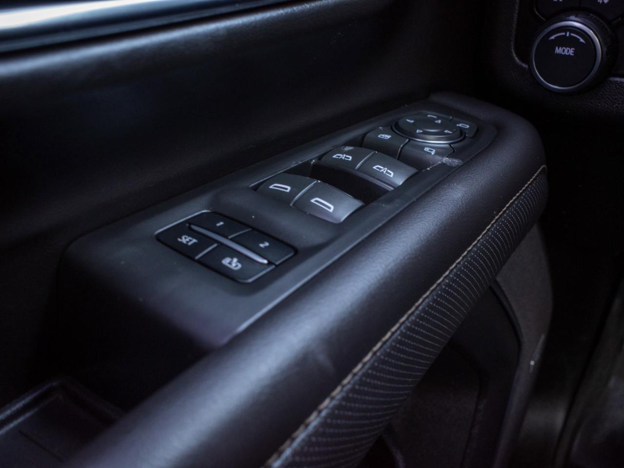 2023 Chevrolet Suburban Premier- Power Sliding Center Console Photo