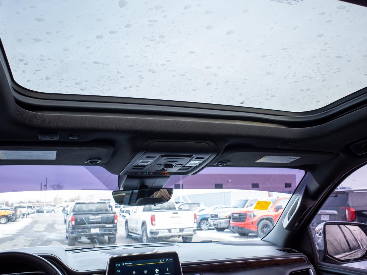 2023 Chevrolet Suburban Premier- Power Sliding Center Console Photo