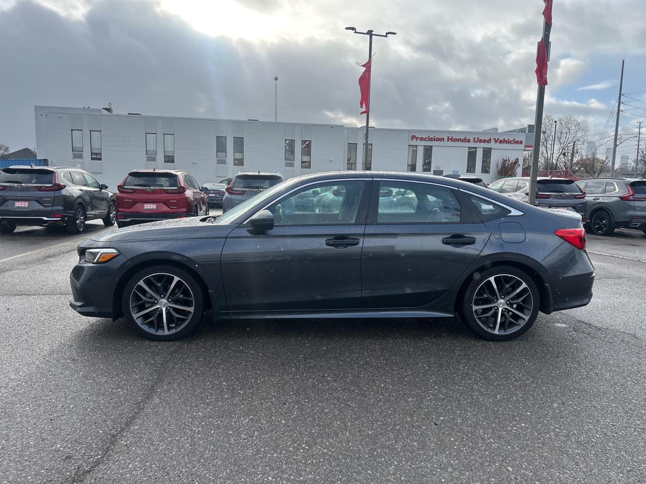 2023 Honda Civic Sedan Touring Leather  Navigation  Sunroof  CarPlay Photo