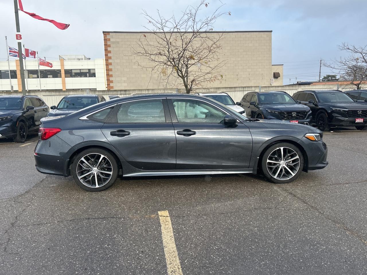 2023 Honda Civic Sedan Touring Leather  Navigation  Sunroof  CarPlay Photo