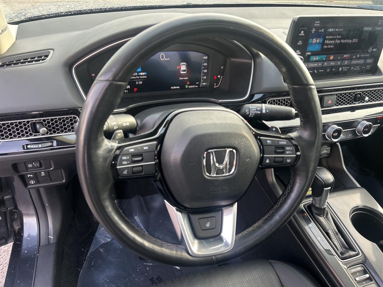 2023 Honda Civic Sedan Touring Leather  Navigation  Sunroof  CarPlay Photo