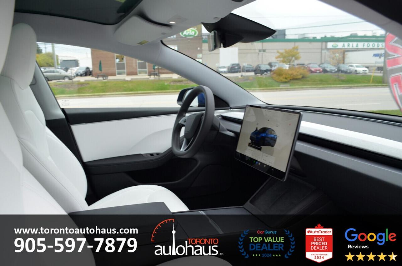 2025 Tesla Model 3 WHITE INT I AWD I OVER 100 TESLAS EVSUPERSTORE.CA Photo