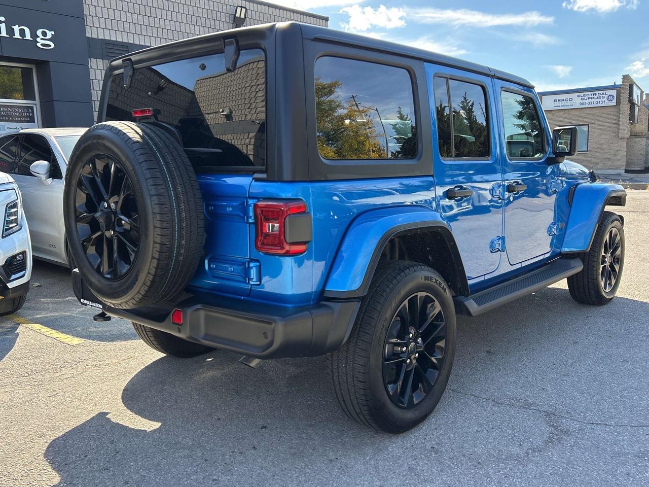 2025 Jeep Wrangler PLUG-IN HYBRID,TECH GROUP,SAFETY GROUP,NAV,CARPLAY Photo