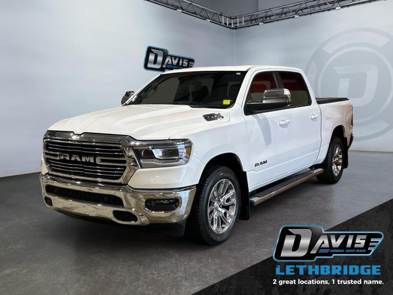 <b>Harman Kardon Sound - Leather - Trailer Tow Pkg - Panoramic Sunroof - 12" Screen - Anti Spin Rear Differential - Local Trade In! <br /> <br /></b><br /> Make light work of tough jobs in this 2024 Ram 1500, with exceptional towing, torque and payload capability. This 2024 Ram 1500 is for sale today in Lethbridge. <br /> <br />The Ram 1500's unmatched luxury transcends traditional pickups without compromising its capability. Loaded with best-in-class features, it's easy to see why the Ram 1500 is so popular. With the most towing and hauling capability in a Ram 1500, as well as improved efficiency and exceptional capability, this truck has the grit to take on any task. This low mileage Crew Cab 4X4 pickup has just 28,909 km. Stock number 40874 is White in colour. It has an Automatic transmission and is powered by a 395HP 5.7L 8 Cylinder Engine. <br /> <br /> Our 1500's trim level is Laramie. Step up to this Ram 1500 Laramie and be rewarded with ventilated and heated front seats with power adjustment, lumbar support and memory function, remote engine start, a leather-wrapped steering wheel, power-adjustable pedals, interior sound insulation, simulated wood/metal interior trim, and dual-zone front climate control with infrared. This truck is also ready for work, with class III towing equipment including a hitch, wiring harness and trailer sway control, heavy duty suspension, power-folding exterior side mirrors with convex wide-angle inserts, and a locking tailgate. Connectivity is handled via an 8.4-inch screen powered by Uconnect 5 with GPS navigation, Apple CarPlay, Android Auto, SiriusXM satellite radio, and 4G LTE wi-fi hotspot. This vehicle has been upgraded with the following features: Cooled Seats, Navigation, Remote Start, 4G Wi-Fi, Heated Steering Wheel, Forward Collision Alert, Climate Control.<br /> <br />To apply right now for financing use this link: <a href=https://www.bridgecitychrysler.com/pre-approval/ target=_blank rel=nofollow noopener noreferrer>https://www.bridgecitychrysler.com/pre-approval/</a><br /><br /> <br /><br />Locally Owned & Trusted for Over 35 Years  Bridge City Chrysler in Lethbridge, AB <br /><br /> At Bridge City Chrysler, weve proudly served the Lethbridge community for more than 35 years, offering an unparalleled car buying experience. Dont just take our word for itour Google reviews speak volumes about our commitment to exceptional service. <br /><br /> Delivery & At-Home Test Drives: Convenient options to suit your lifestyle. <br /><br /> Flexible Financing for Everyone: Get the vehicle you need with financing solutions tailored to your situation. <br /><br /> Full Mechanical Inspections & Professional Cleaning: Every vehicle is thoroughly inspected and cleaned before it hits our lot.<br /><br /> We take all makes and models on trade and offer competitive pricing with inventory that changes daily. Whether you're shopping for a Chrysler, Dodge, Jeep, RAM, or FIAT, our AMVIC Licensed dealership makes it easy to browse, buy, and drive away.<br /><br /> Located in Lethbridge, AB, we proudly serve customers in Fort Macleod, Taber, Claresholm, and Coaldale. Shop online or visit us today to experience the best in sales, service, and selection. Standard bank rates apply; taxes are additional.<br /><br /> Vehicle pricing offer shown expires 2026-01-31. <br /> Come by and check out our fleet of 80+ used cars and trucks and 130+ new cars and trucks for sale in Lethbridge. o~o
