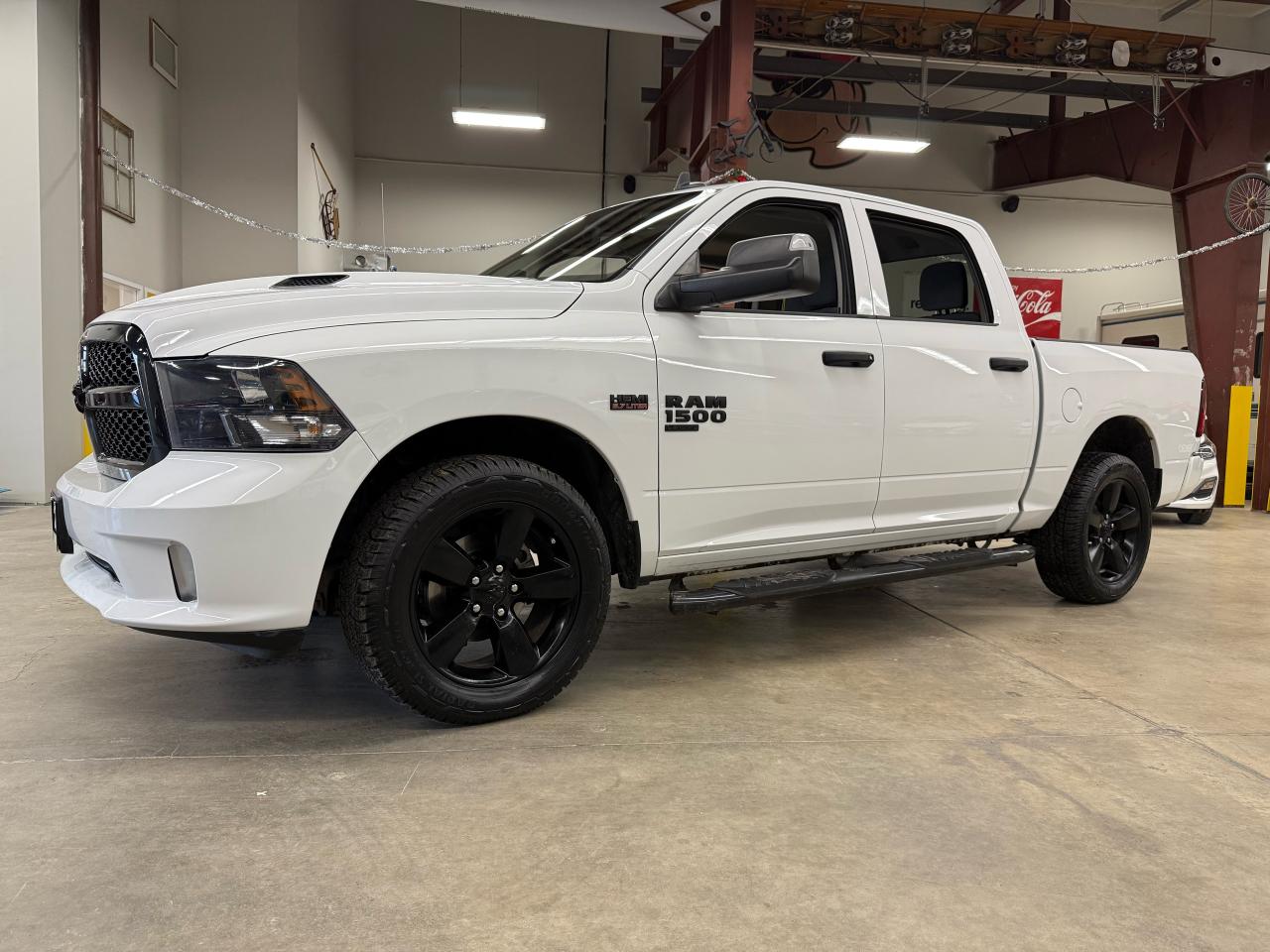 <p>Did someone ask for a sweet truck?  Well this is it!!! Check out this 2021 RAM 1500 with a HEMI! It has been well-maintained with 78,766 km on the odometer. The CarFax shows no accident damage records found.    Factory Trailer Brake Controller, Heated Seats, Heated Steering Wheel, Running Boards, Blacked out RIMs and Badges, Trailer flip Mirrors, Heated Mirrors, very clean inside and out, box is in great shape!</p><p>This vehicle is Certified and has been reconditioned with a fresh oil change and fluids topped up.  We installed 4 new tires & wheel alignment, replaced the lower right ball joint, new rotors, pads & calipers in the front, new pads and rotors on the rear, new parking brake assembly and a brand new windshield!  You should be good for a while now.</p><p><strong><em><span style=text-decoration: underline;>Congratulation on reading the fine print!!!</span></em></strong>,   The safety is included in every car we sell, as well as a copy of the CarFax report.  We have ZERO extra charges - just tax and plates - no bait & switch, no nitro in the tires, no cloth protection on the seats.... just an honest price without any tricks.  All Vehicles are <span style=text-decoration: underline;>Sold Certified</span> and come with a 3 month/3,000 km Bronze Global Warranty, maximum individual claim limit of $1,000. (extended warranties and coverages available).   We will review what we did to safety the car and what we replaced.  We believe that you should know exactly what you are buying.</p><p>At LuckyDog we believe in transparency, thats why all our vehicles come with a complete CarFax Vehicle report to ensure your not buying a salvaged or rebuilt vehicle.   You should know exactly what you are buying, ask questions.   </p><p>* While every reasonable effort is made to ensure the accuracy of this information, some vehicle information may not be exactly as shown. </p>