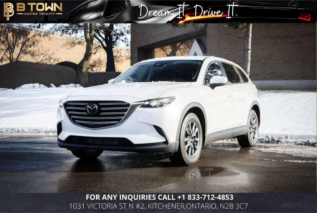 <h3 data-start=0 data-end=73><strong data-start=4 data-end=71>2022 Mazda CX-9 &ndash; Stylish, Capable & Premium-Feel Three-Row SUV</strong></h3>
<p data-start=74 data-end=696>The 2022 Mazda CX-9 is a refined midsize crossover SUV that blends athletic performance with upscale comfort, advanced technology, and versatile three-row capability. Powered by a responsive turbocharged 2.5L engine paired with a smooth six-speed automatic and Mazda&rsquo;s i-Activ all-wheel-drive system as standard, the CX-9 delivers confident handling and excellent road manners for daily driving or family trips. Inside, you&rsquo;ll find a well-designed cabin with intuitive tech and thoughtful conveniences, while a robust suite of safety features gives you peace of mind on every journey. <span class= data-state=closed></span>

<hr data-start=698 data-end=701 />
<h3 data-start=703 data-end=733><strong data-start=707 data-end=733>Key Features & Options</strong></h3>
<ul data-start=734 data-end=1713>
<li data-start=734 data-end=808>
<p data-start=736 data-end=808>2.5L Turbocharged Inline-4 Engine with up to 250 hp & 320 lb-ft torque

</li>
<li data-start=809 data-end=875>
<p data-start=811 data-end=875>Skyactiv-Drive 6-Speed Automatic Transmission with Manual Mode

</li>
<li data-start=876 data-end=918>
<p data-start=878 data-end=918>i-Activ All-Wheel Drive (AWD) Standard

</li>
<li data-start=919 data-end=974>
<p data-start=921 data-end=974>G-Vectoring Control Plus & Off-Road Traction Assist

</li>
<li data-start=975 data-end=1031>
<p data-start=977 data-end=1031>10.25&Prime; Full-Colour Centre Display with Mazda Connect

</li>
<li data-start=1032 data-end=1078>
<p data-start=1034 data-end=1078>Apple CarPlay&reg; & Android Auto&trade; Integration

</li>
<li data-start=1079 data-end=1101>
<p data-start=1081 data-end=1101>Heated Front Seats

</li>
<li data-start=1102 data-end=1142>
<p data-start=1104 data-end=1142>Three-Zone Automatic Climate Control

</li>
<li data-start=1143 data-end=1196>
<p data-start=1145 data-end=1196>Mazda Connected Services with Trial Wi-Fi Hotspot

</li>
<li data-start=1197 data-end=1241>
<p data-start=1199 data-end=1241>Remote Keyless Entry & Push-Button Start

</li>
<li data-start=1242 data-end=1286>
<p data-start=1244 data-end=1286>Bluetooth&reg; Connectivity & Dual USB Ports

</li>
<li data-start=1287 data-end=1304>
<p data-start=1289 data-end=1304>Backup Camera

</li>
<li data-start=1305 data-end=1357>
<p data-start=1307 data-end=1357>Blind Spot Monitoring & Rear Cross-Traffic Alert

</li>
<li data-start=1358 data-end=1403>
<p data-start=1360 data-end=1403>Mazda Radar Cruise Control with Stop & Go

</li>
<li data-start=1404 data-end=1452>
<p data-start=1406 data-end=1452>Lane Departure Warning with Lane Keep Assist

</li>
<li data-start=1453 data-end=1496>
<p data-start=1455 data-end=1496>LED Headlights & Daytime Running Lights

</li>
<li data-start=1497 data-end=1529>
<p data-start=1499 data-end=1529>Roof Rails (on select trims)

</li>
<li data-start=1530 data-end=1558>
<p data-start=1532 data-end=1558>Available Power Moonroof

</li>
<li data-start=1559 data-end=1593>
<p data-start=1561 data-end=1593>Available Premium Sound System

</li>
<li data-start=1594 data-end=1713>
<p data-start=1596 data-end=1713>Optional Advanced Safety & Parking Aids (360&deg; View Monitor, Front/Rear Sensors)

</li>
</ul>



HST and licensing will be extra




* $999 Financing fee conditions may apply*




Financing Available at as low as 6.29% O.A.C




We approve everyone with bad credit, including newcomers and students.




Previously declined by a bank? No problem !!




Let the experienced professionals handle your credit application.




Apply for pre-approval today !!




At B TOWN AUTOS TRICITY, we are not only concerned about selling great used Vehicles at the most competitive prices at our new location, 1031 Victoria St N #2, Kitchener, Ontario, N2B 3C7. We also believe in the importance of establishing a lifelong relationship with our clients, which starts from the moment you walk into the dealership. Were here for you every step of the way and aim to provide the most prominent, friendly and timely service with each experience you have with us. You can think of us as being like &lsquo;YOUR FAMILY IN THE BUSINESS&rsquo; where you can always count on us to provide you with the best automotive care