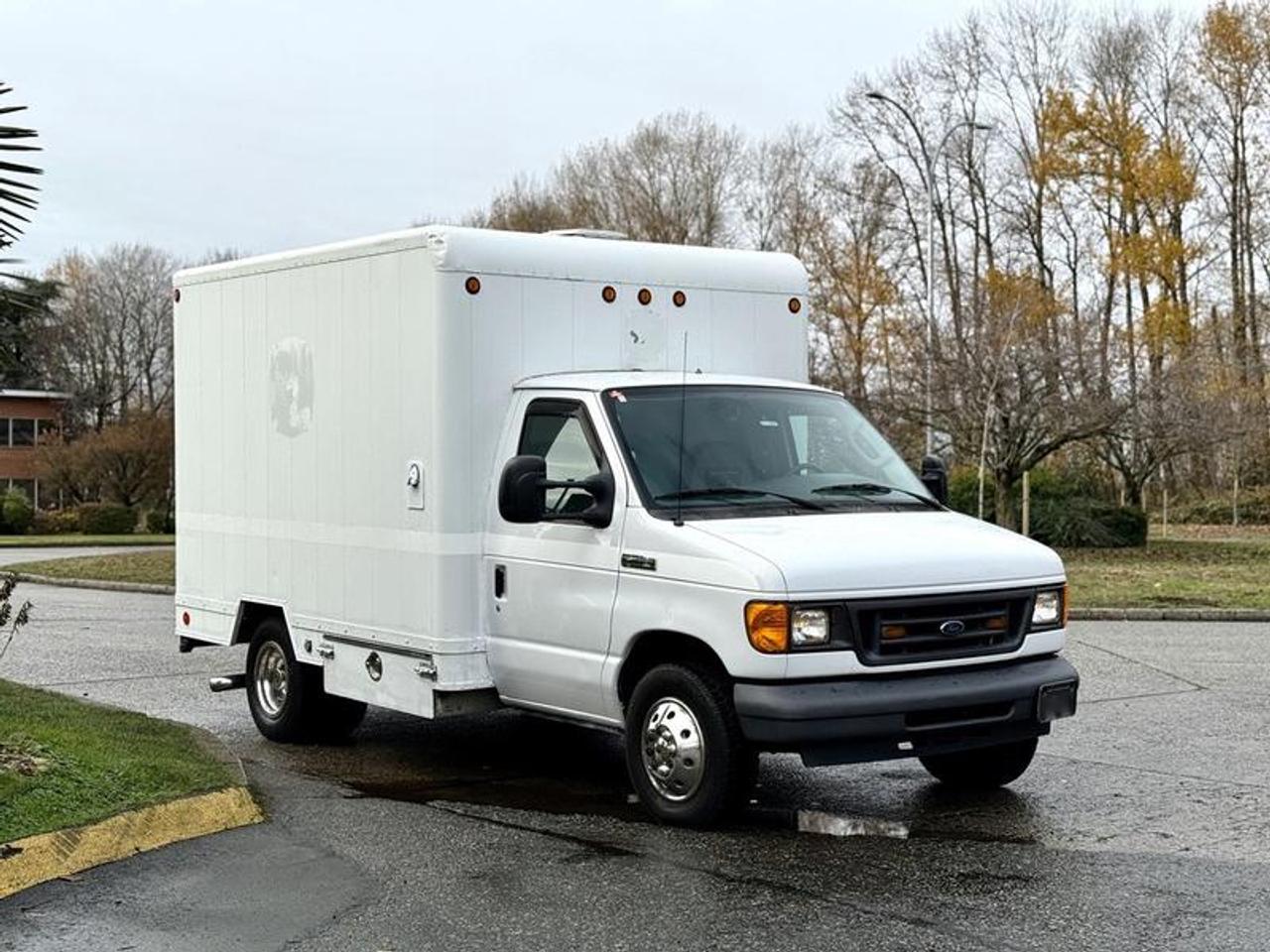 This 2007 Ford E-350 Super Duty diesel 10-foot cube van is equipped with a 6.0L 8-cylinder engine, automatic transmission and rear-wheel drive, and features a white exterior with a grey vinyl interior. It includes rear work shelving, a Cast Iron Series Speedaire compressor, storage compartments, power outlets, manual windows and door locks, cup holders, reverse camera and an AM/FM radio. The cube interior measures approximately 10 feet long, 7 feet 8 inches wide and 6 feet 8 inches high. Overall vehicle dimensions are about 19 feet 2 inches long, 7 feet 11 inches wide and 9 feet 4 inches high, with a GVWR of 5,216 kg (11,500 lb). Certification and decal valid until November 2026.  $17,720.00 plus $375 processing fee, $18,095.00 total payment obligation before taxes.   Listing report, warranty, contract commitment cancellation fee, financing available on approved credit (some limitations and exceptions may apply). All above specifications and information is considered to be accurate but is not guaranteed and no opinion or advice is given as to whether this item should be purchased. We do not allow test drives due to theft, fraud, acts of vandalism and undetectable impaired driving. Instead we provide the following benefits: Complimentary Warranty (with options to extend), Limited Money Back Satisfaction Guarantee on Fully Completed Contracts, Contract Commitment Cancellation, and an Open-Ended Sell-Back Option. Ask seller for details or call 604-522-REPO(7376) to confirm listing availability.