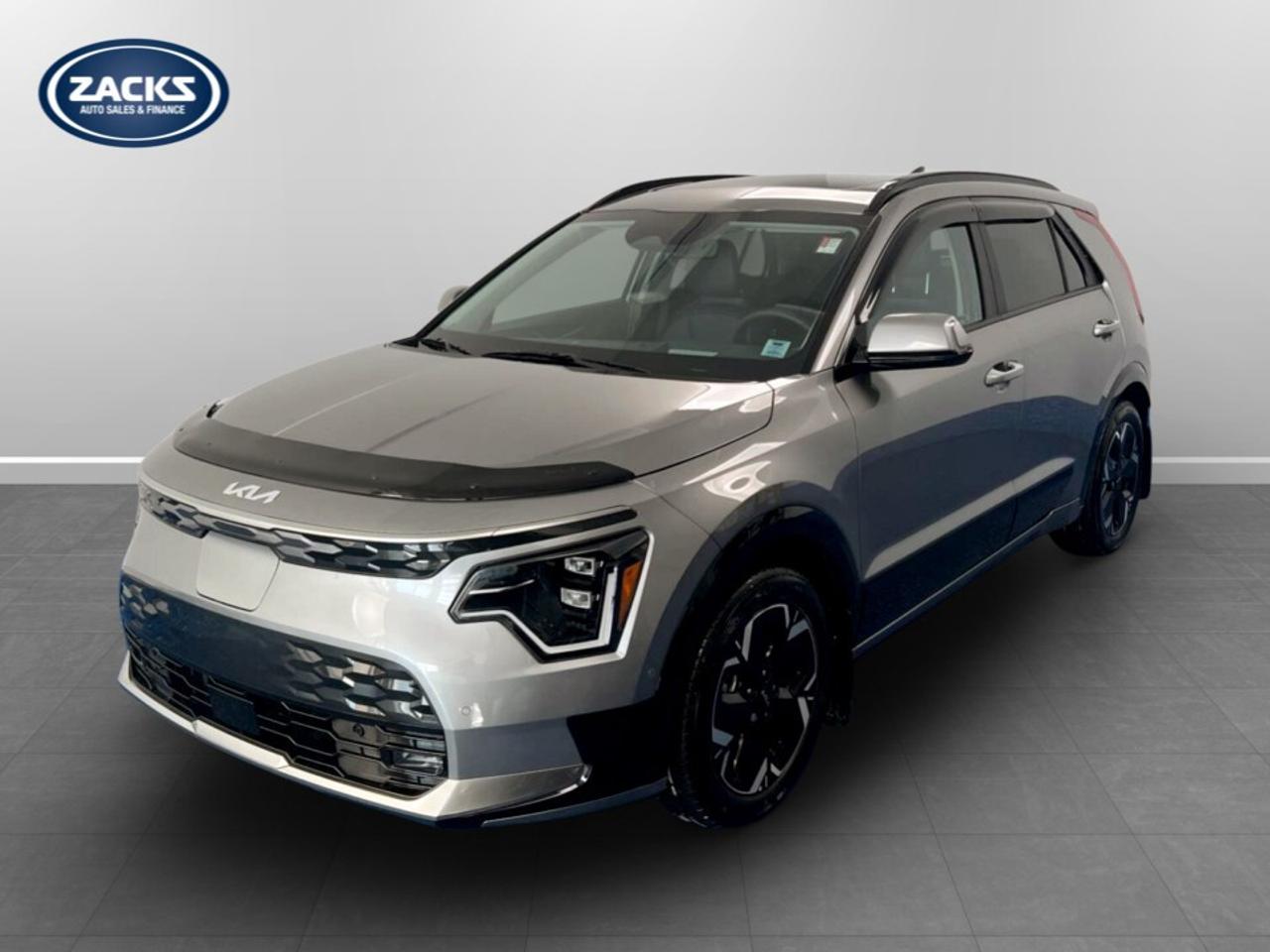 New Price! 2025 Kia Niro EV Wave EV Wave | Leather seats | Sunroof | Zacks Certified. 1-Speed Automatic FWD Steel Gray Electric Motor<br />Odometer is 2887 kilometers below market average!<br /><br />17''' Alloy Wheels, Air Conditioning, AM/FM radio: SiriusXM, Apple CarPlay & Android Auto, Automatic temperature control, Exterior Parking Camera Rear, Front Bucket Seats, Front fog lights, harman/kardon® Speakers, Heads-Up Display, Heated door mirrors, Heated front seats, Memory seat, Navigation System, Power driver seat, Power Liftgate, Power moonroof, Rain sensing wipers, Remote keyless entry, Synthetic Leather Seat Trim, Tilt steering wheel, Turn signal indicator mirrors, Ventilated front seats.<br /><br />Certification Program Details: Fresh 2 Yr MVI | 30 day warranty* | 110 point inspection | Full tank of fuel | Krown rustproofed | Flexible financing options | Professionally detailed<br /><br />This vehicle is Zacks Certified! You're approved! We work with you. Together we'll find a solution that makes sense for your individual situation. Please visit us or call 902 843-3900 to learn about our great selection.<br /><br />With 22 lenders available Zack's Auto Sales can offer our customers with the lowest available interest rate. Thank you for taking the time to check out our selection!